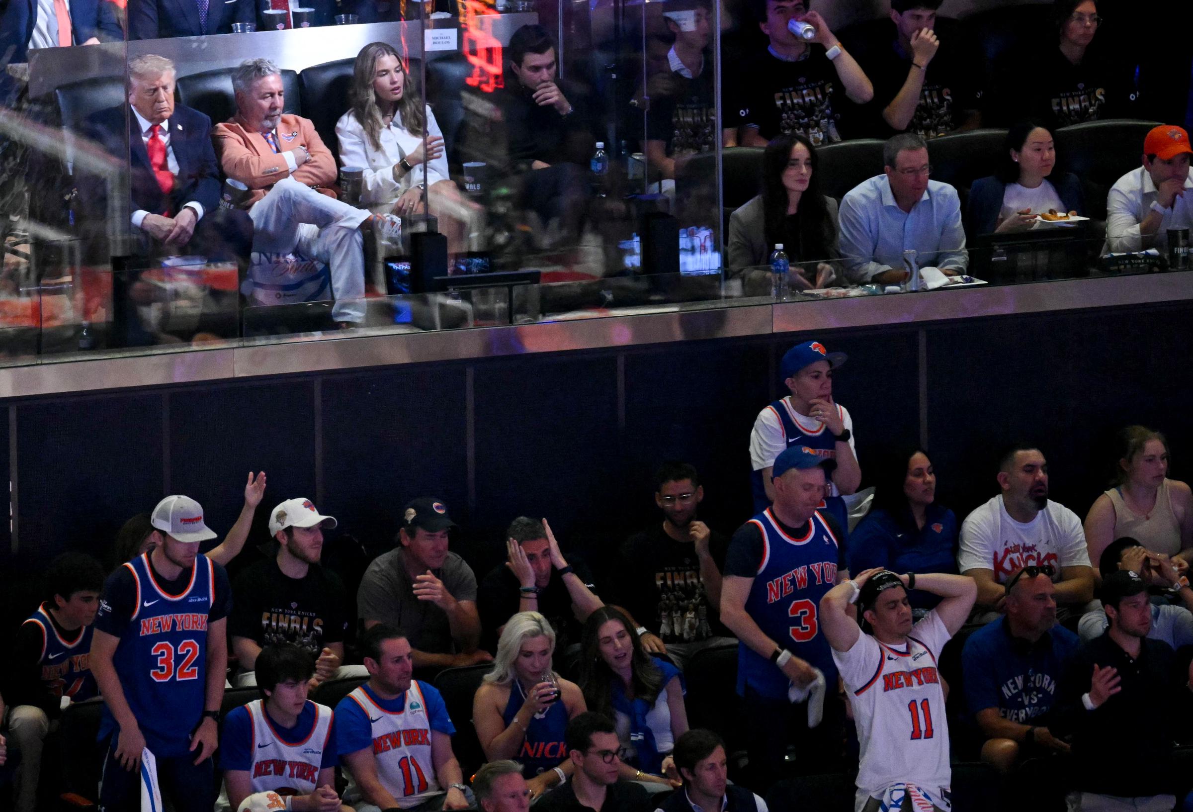 Donald Trump watches Game 3 of the NBA Finals from a courtside suite alongside Knicks owner James Dolan and granddaughter Kai Trump. Following New York's loss, Stephen A. Smith jokingly blamed the president for disrupting the team's momentum. | Source: Getty Images