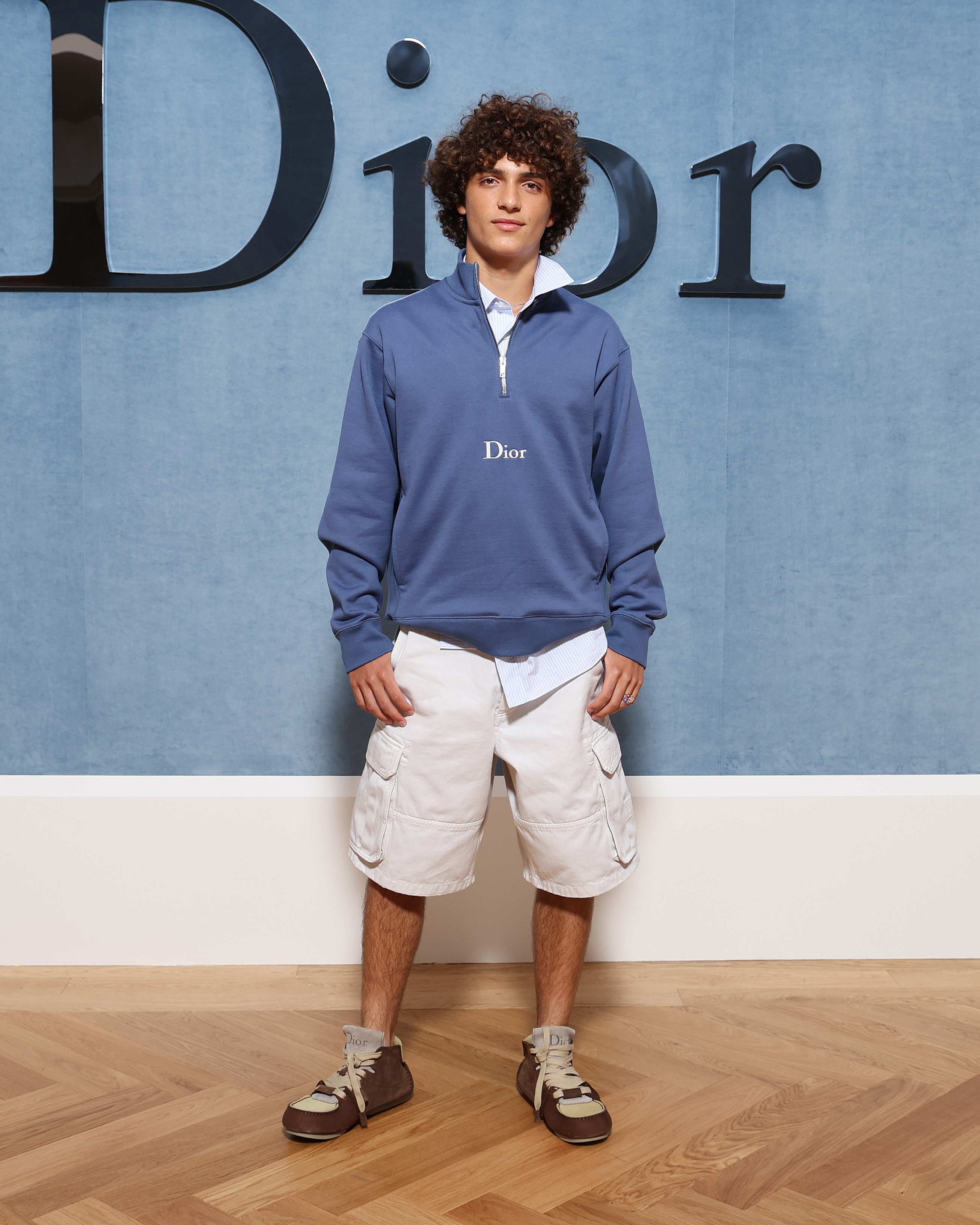 Levi McConaughey at the Dior Homme's Menswear Ready-to-wear Spring-Summer 2026 collection fashion show during Paris Fashion Week in Paris, on June 27, 2025. | Source: Getty Images
