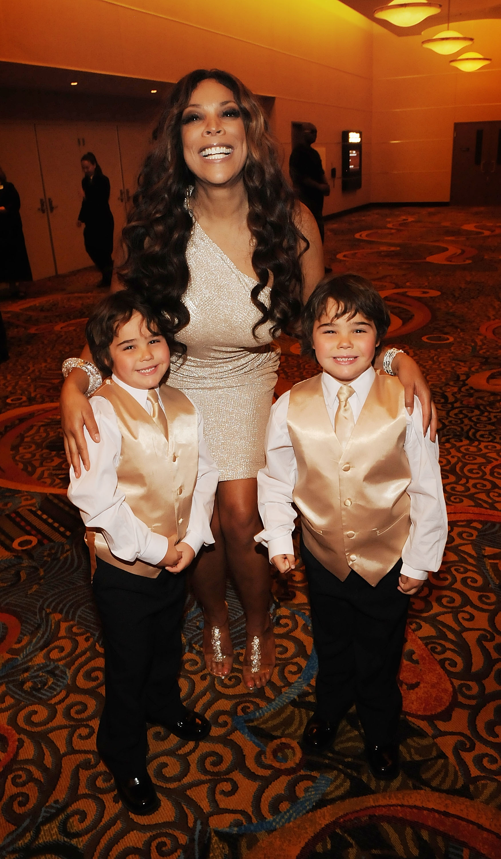 This earlier photo shows Justin and Jordan Rogers as young boys posing with Wendy Williams at an event honoring their father, offering a glimpse of the twins years before their latest birthday photo sparked a debate over the family resemblance. | Source: Getty Images