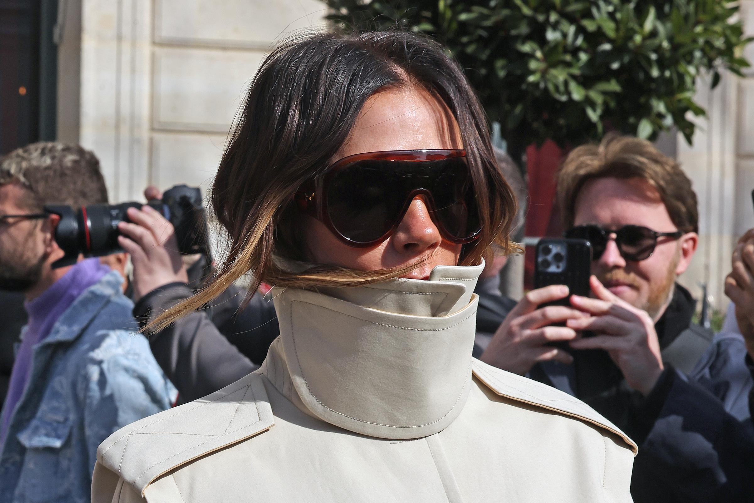 Victoria's fitted vacation looks are consistent with the polished fashion image she maintains away from Portofino. Months earlier, she stepped out during Paris Fashion Week in an ivory high-neck look and oversized sunglasses on March 8, 2025. | Source: Getty Images