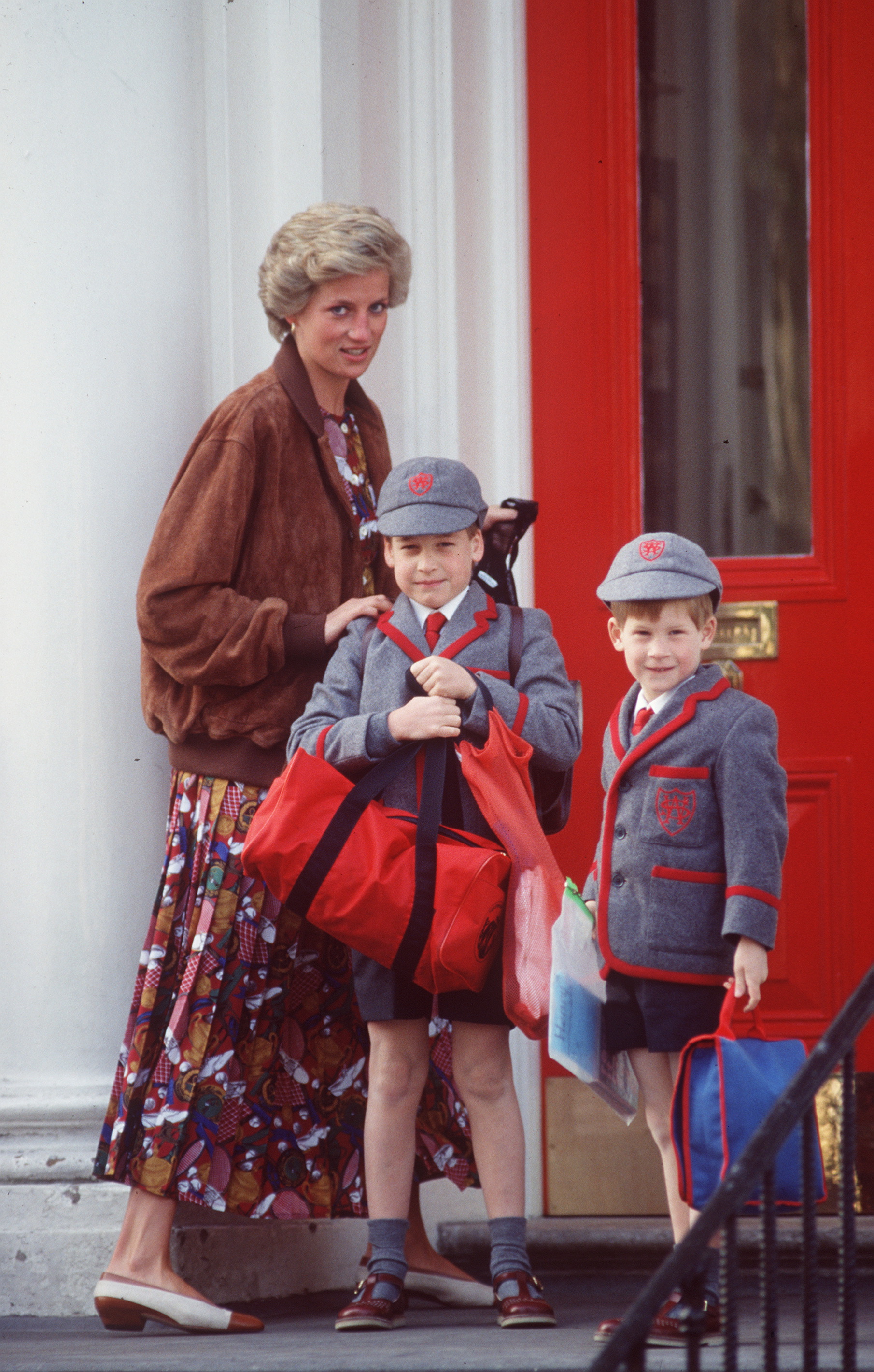 William and Harry headed back to Wetherby School with their mother, Princess Diana, in London in April 1990. As schoolchildren, the brothers used "Wales" as a surname, taking it from their father Charles' title at the time. | Source: Getty Images
