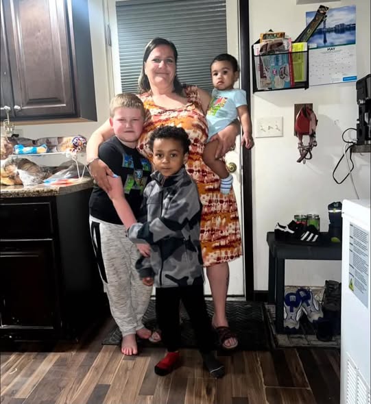 Twila Tanner smiles alongside three young children in a cherished family snapshot. Her devastating death in the October 9 mass shooting left behind grieving children and grandchildren, including adolescent children who must now grow up without her. | Source: Facebook/AlissaSue