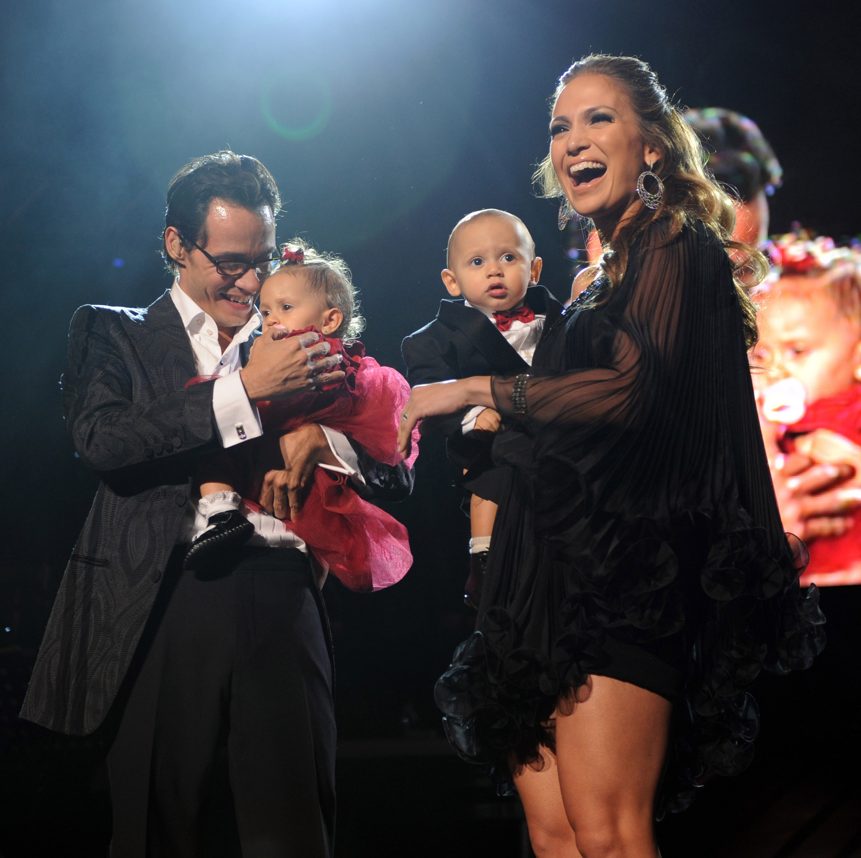 Jennifer Lopez and Marc Anthony brought their twins, Max and Emme, onstage during Marc's Valentine's Day concert at Madison Square Garden in 2009, shortly before the children's first birthday. | Source: Getty Images
