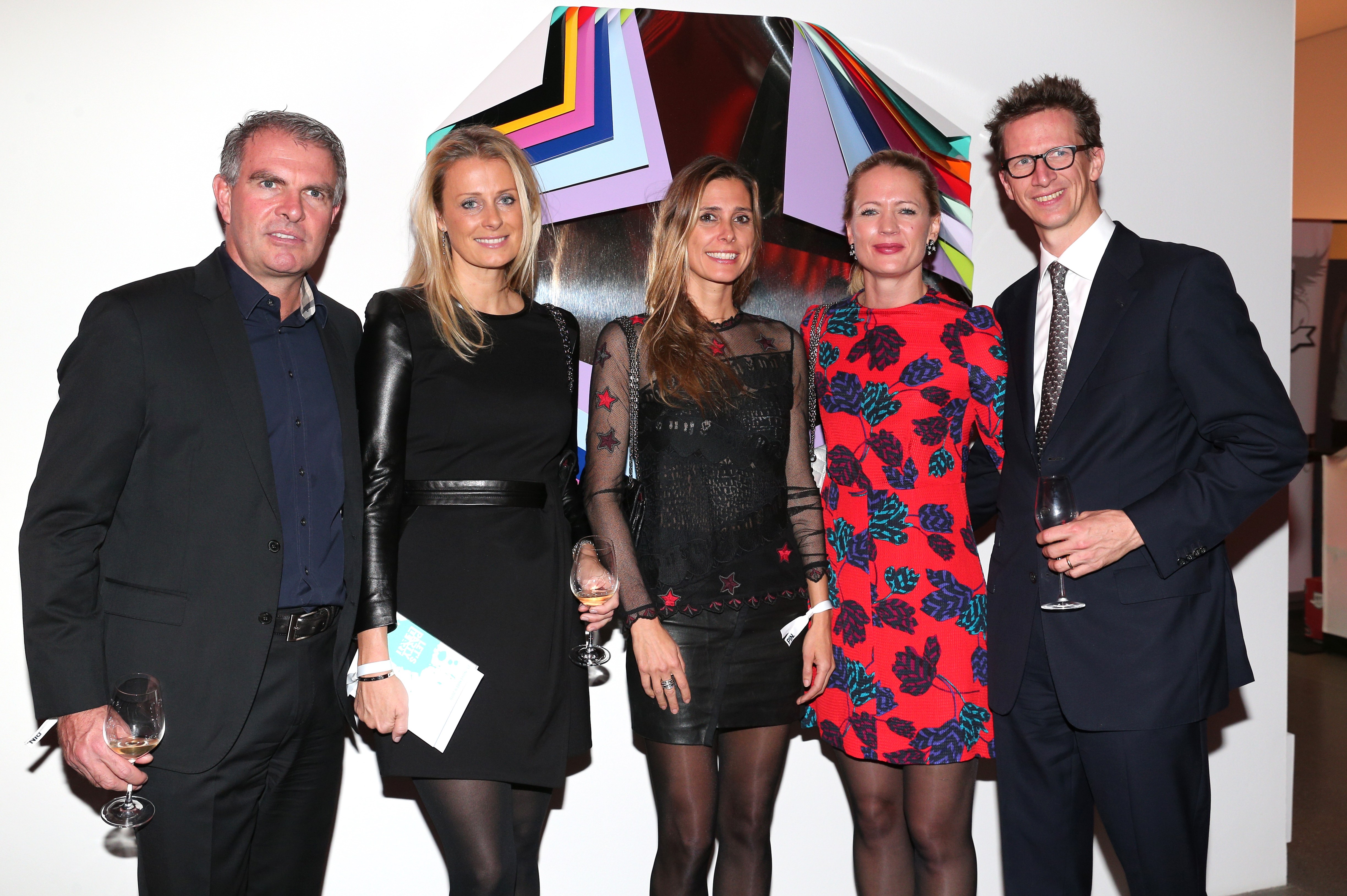 Carsten and Vivian Spohr, Conny Lehmann, Princess Anna von Bayern and Prince Manuel von Bayern in front of an artwork by Jim Lambie during the PIN Party 4 Art at Pinakothek der Moderne on November 21, 2015, in Munich, Germany | Source: Getty Images
