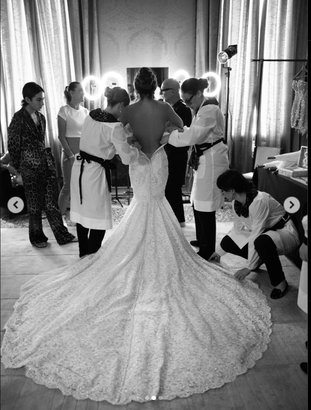 Lauren Sánchez, seen from the back, getting dressed for her wedding day, from an Instagram post dated June 27, 2025. | Source: Instagram/laurensanchezbezos
