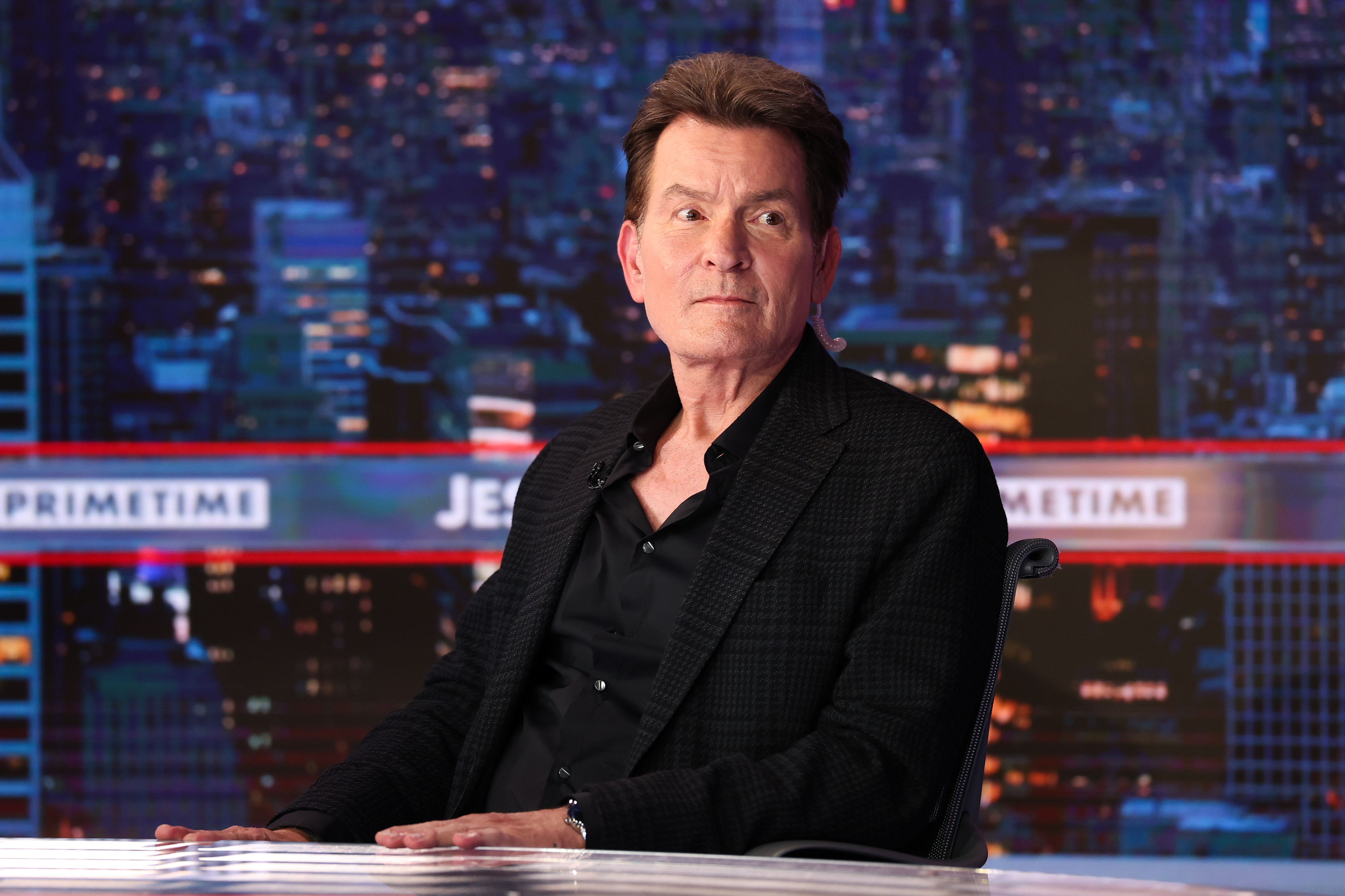 Charlie Sheen appears as a guest on a television program. | Source: Getty Images