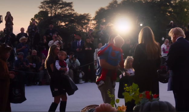The festivities brought together families, photographers, and costumed children for an evening of Halloween fun. The president and first lady personally distributed Hershey's chocolate bars to their young guests. | Source: Instagram/firstladyoffice