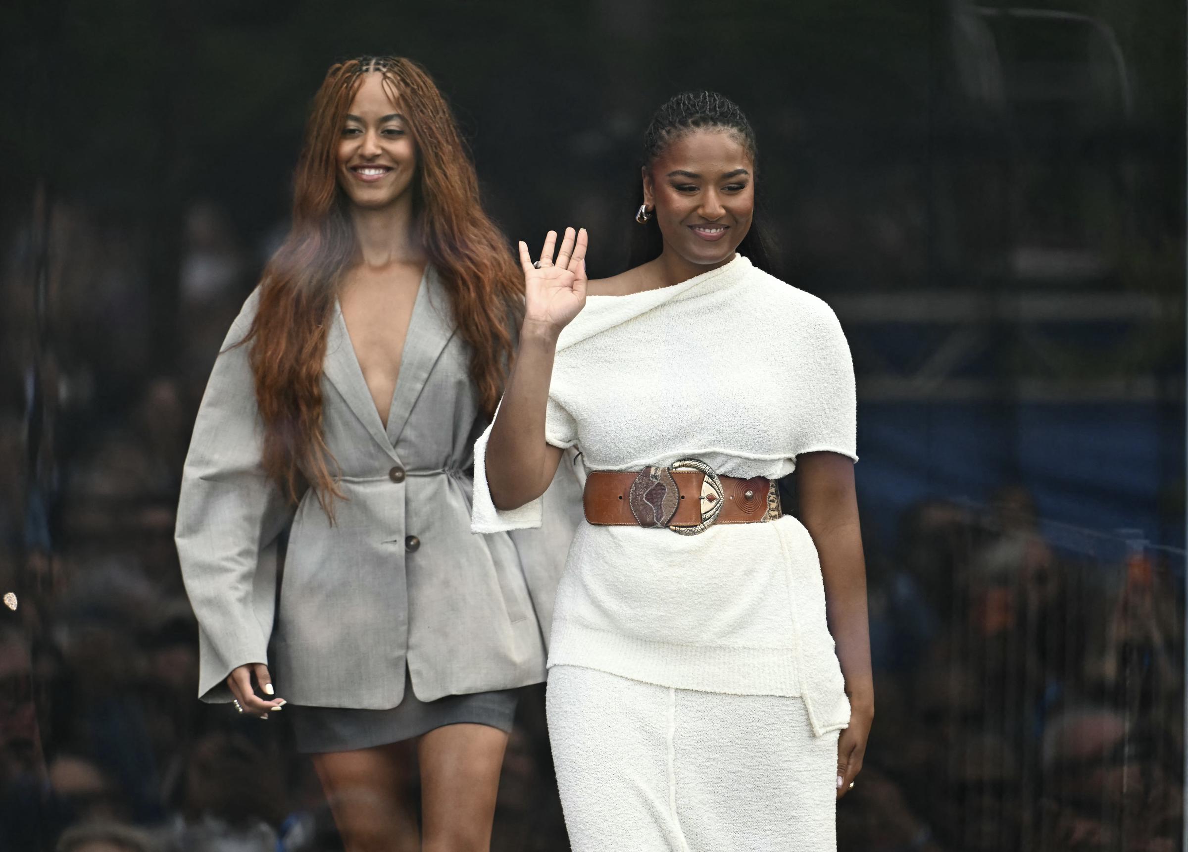 Sasha Obama and Malia Obama attend the dedication ceremony for the opening of the Barack Obama Presidential Center, in John Lewis Plaza, on June 18, 2026 in Chicago, Illinois. | Source: Getty Images