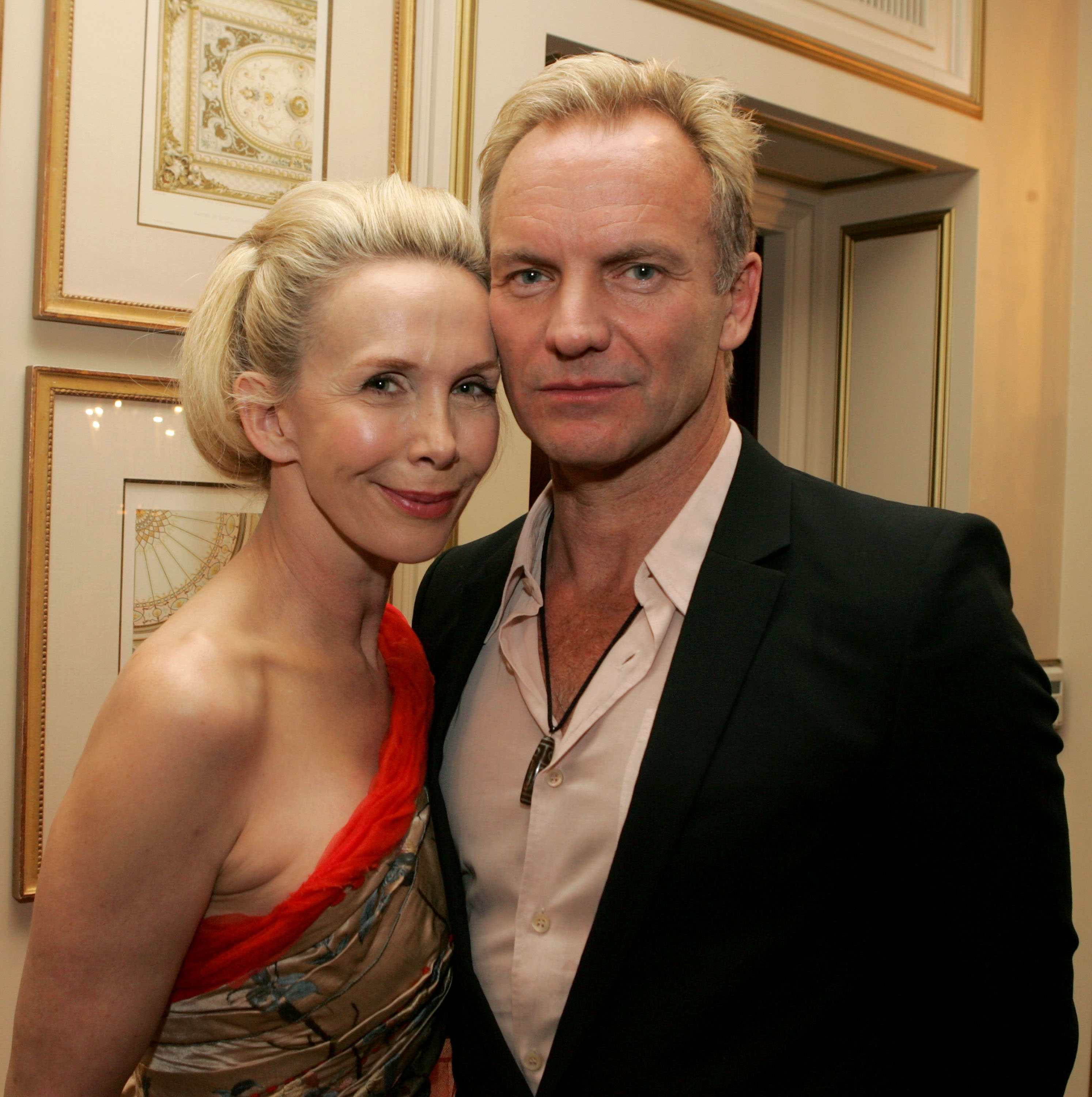 Trudie Styler, at 51, was captured with an evenly toned complexion, featuring delicate cheekbone structure, a faint, knowing half-smile, and her blonde hair styled back into an elegant up-do, while arriving at the first annual UNICEF Snowflake Ball with Sting on November 30, 2005, at the Regent Beverly Wilshire Hotel in Beverly Hills, California.