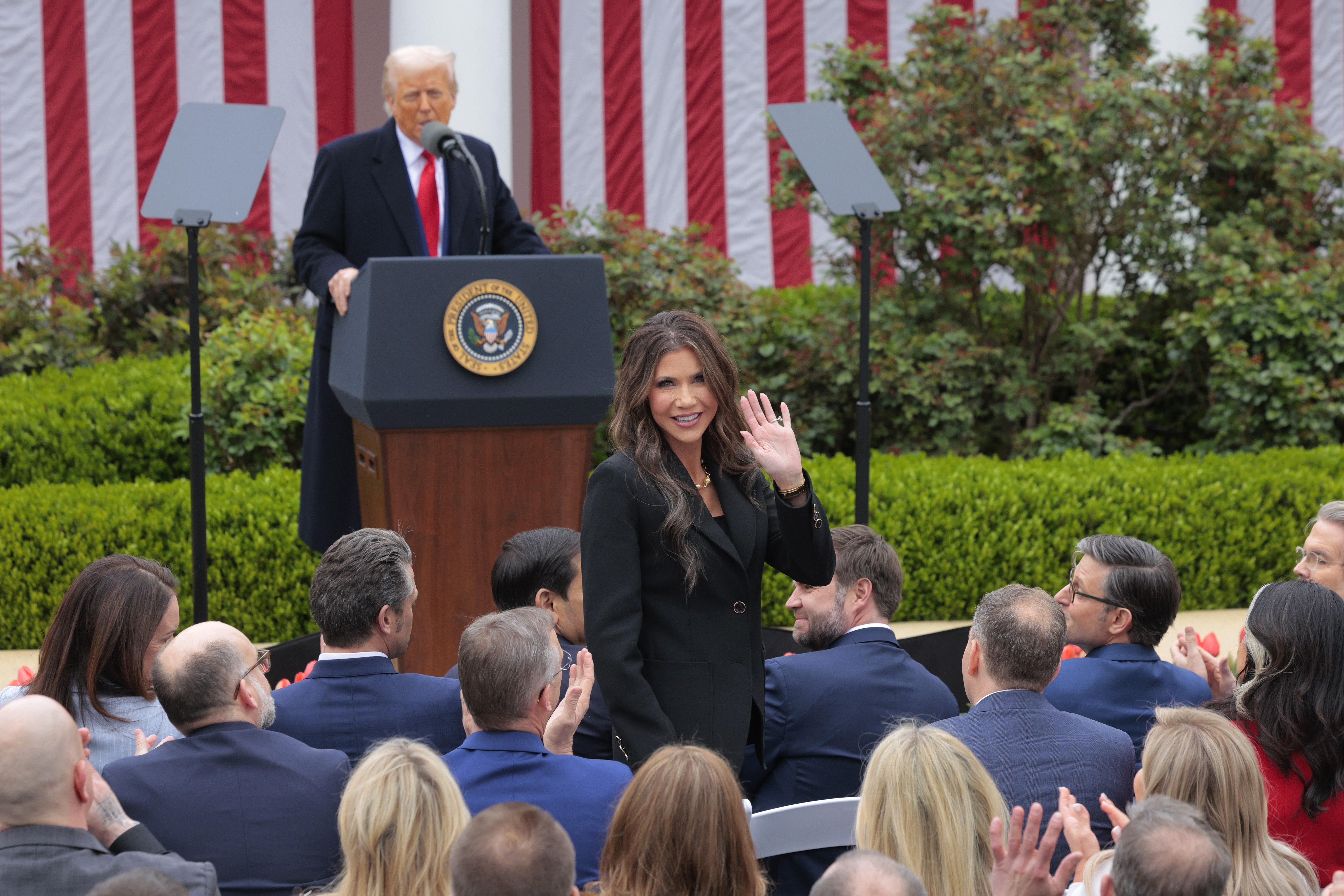 Donald Trump recognizing Kristi Noem during the "Make America Wealthy Again" trade announcement event in the Rose Garden in Washington, D.C., on April 2, 2025. | Source: Getty Images
