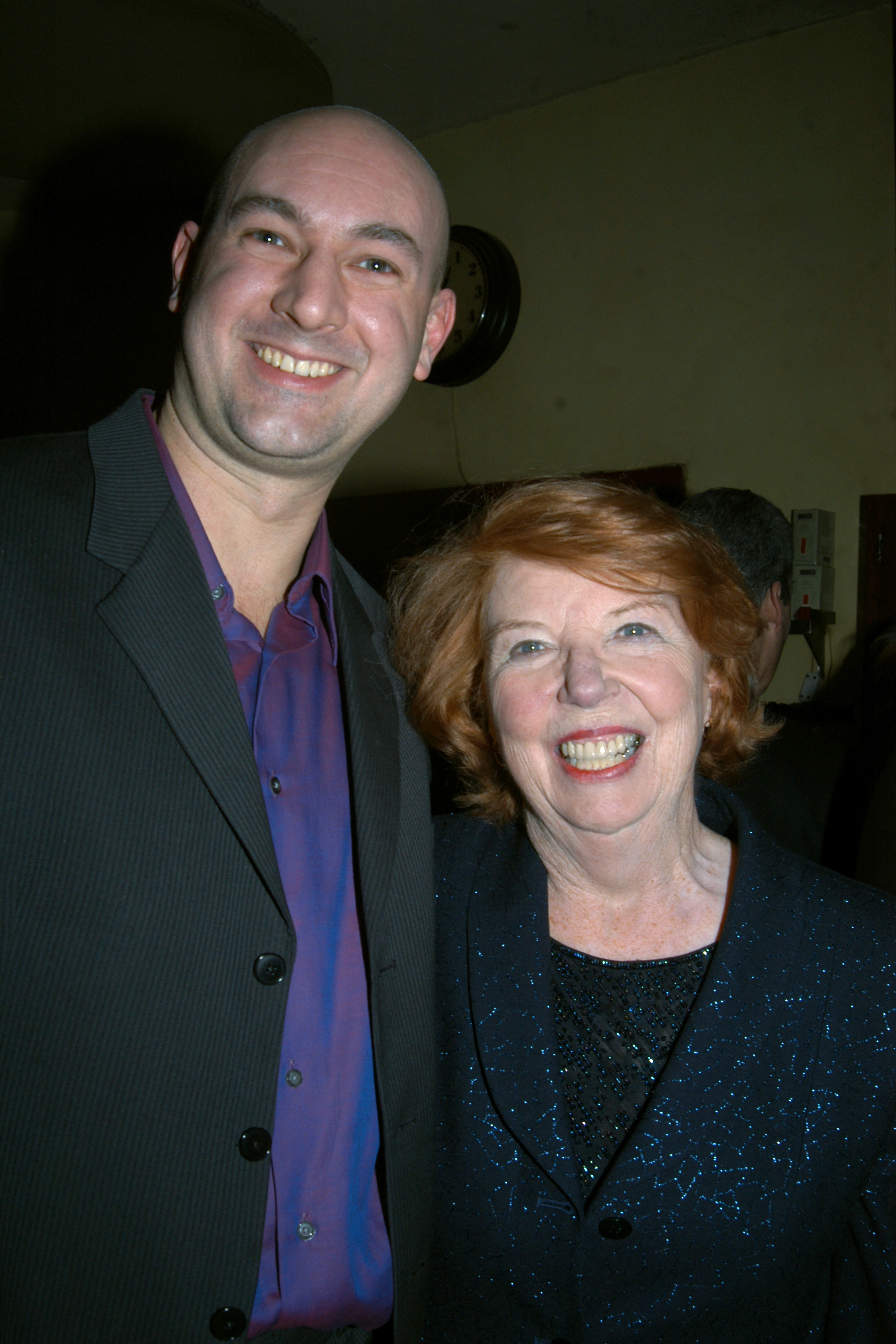 Daniel Stewart poses with playwright Carol Hemingway at the opening-night party for her play "It Just Catches." | Source: Getty Images