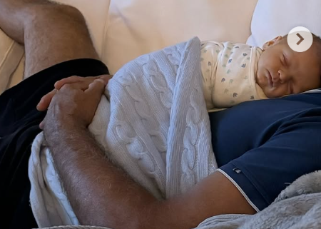 A glimpse of Niko, asleep in his dad's arms, from a post dated July 26, 2024 | Source: Instagram/karolineleavitt