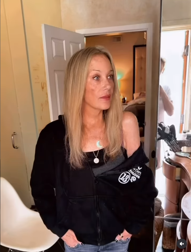 Christina Applegate showed off her fresh blonde hair as she posed in a black jacket and jeans, giving fans another close look at her appearance in the September 21 video. The actress also drew attention to a new spot on her cheek, which she mentioned casually in the post's caption. | Source: Instagram/christinaapplegate