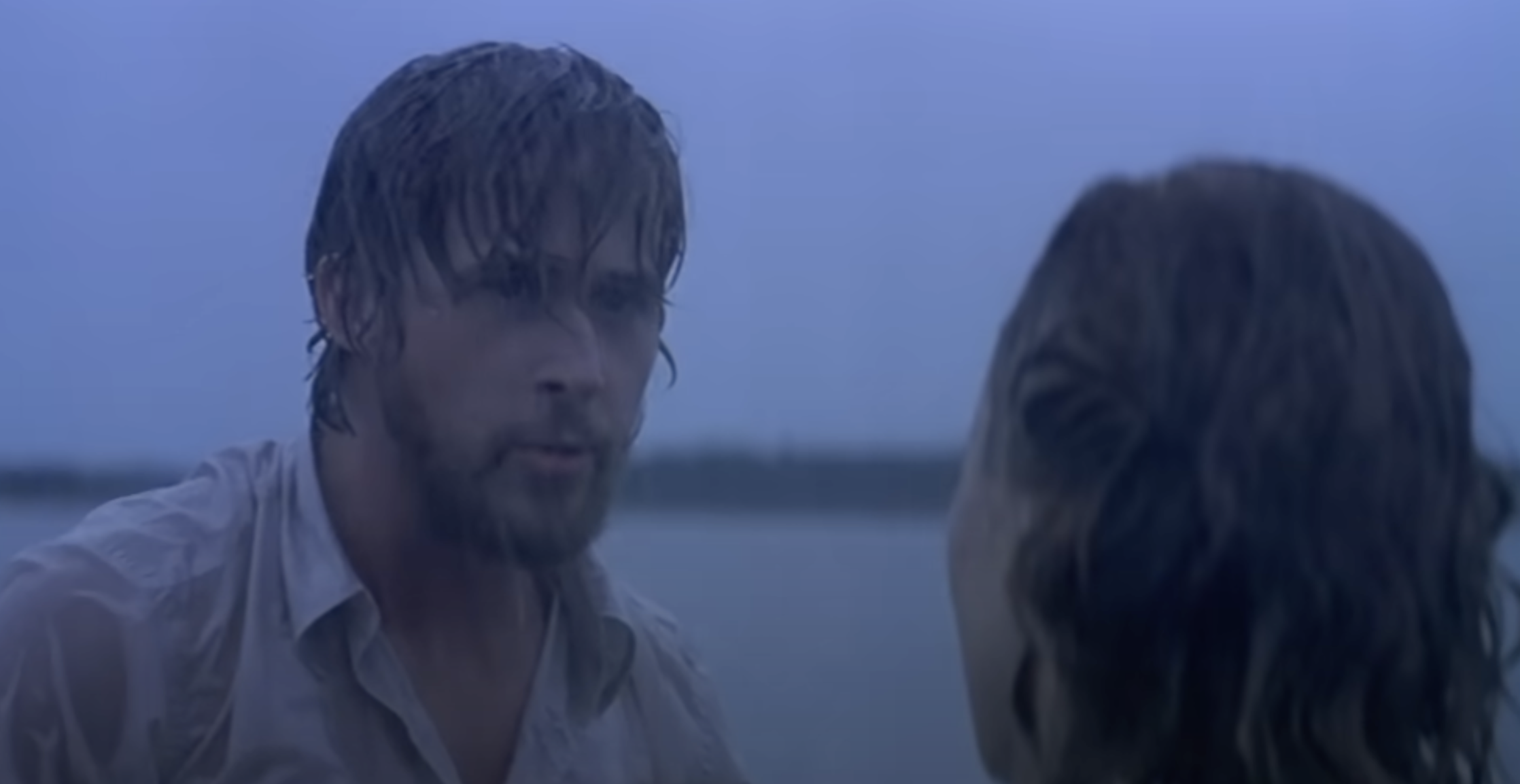 Noah passionately engaging with Allie as they both get soaked by the rain. | Source: IMDb