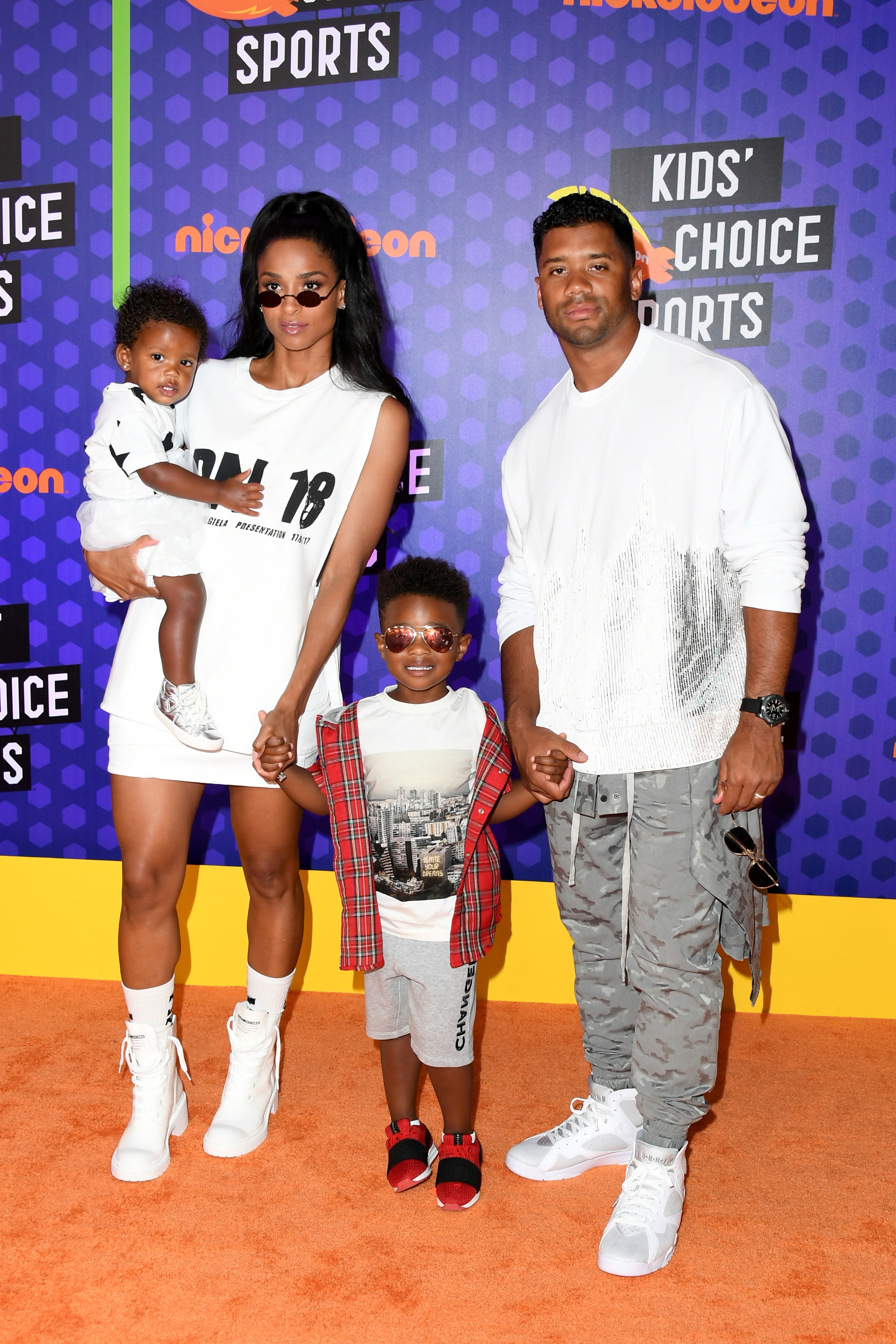 Sienna Princess Wilson, 1, Ciara, 32, Future Zahir Wilburn, 4, and Russell Wilson, 29, attend the Nickelodeon Kids' Choice Sports at Barker Hangar on July 19, 2018, in Santa Monica, California.