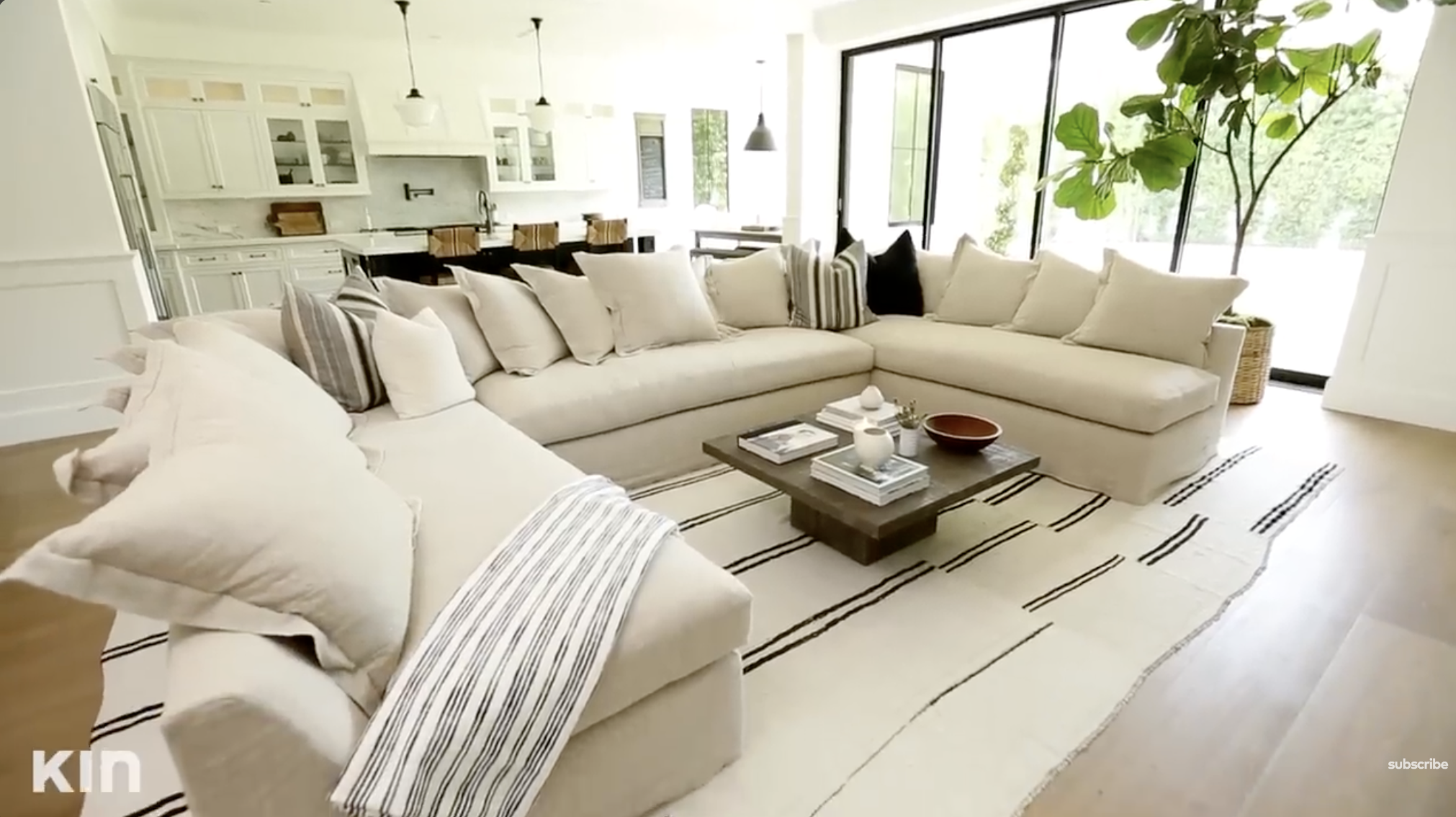 The huge, plush couch by Tia Mowry's family corner in her home, posted on October 26, 2018. | Source: YouTube/Tia Mowry's Quick Fix