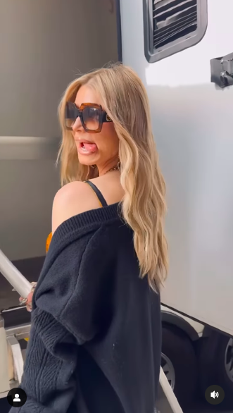 Jessica Simpson standing on the steps of her "American Idol" trailer while poking her tongue out, posted on May 18, 2025. | Source: Instagram/jessicasimpson