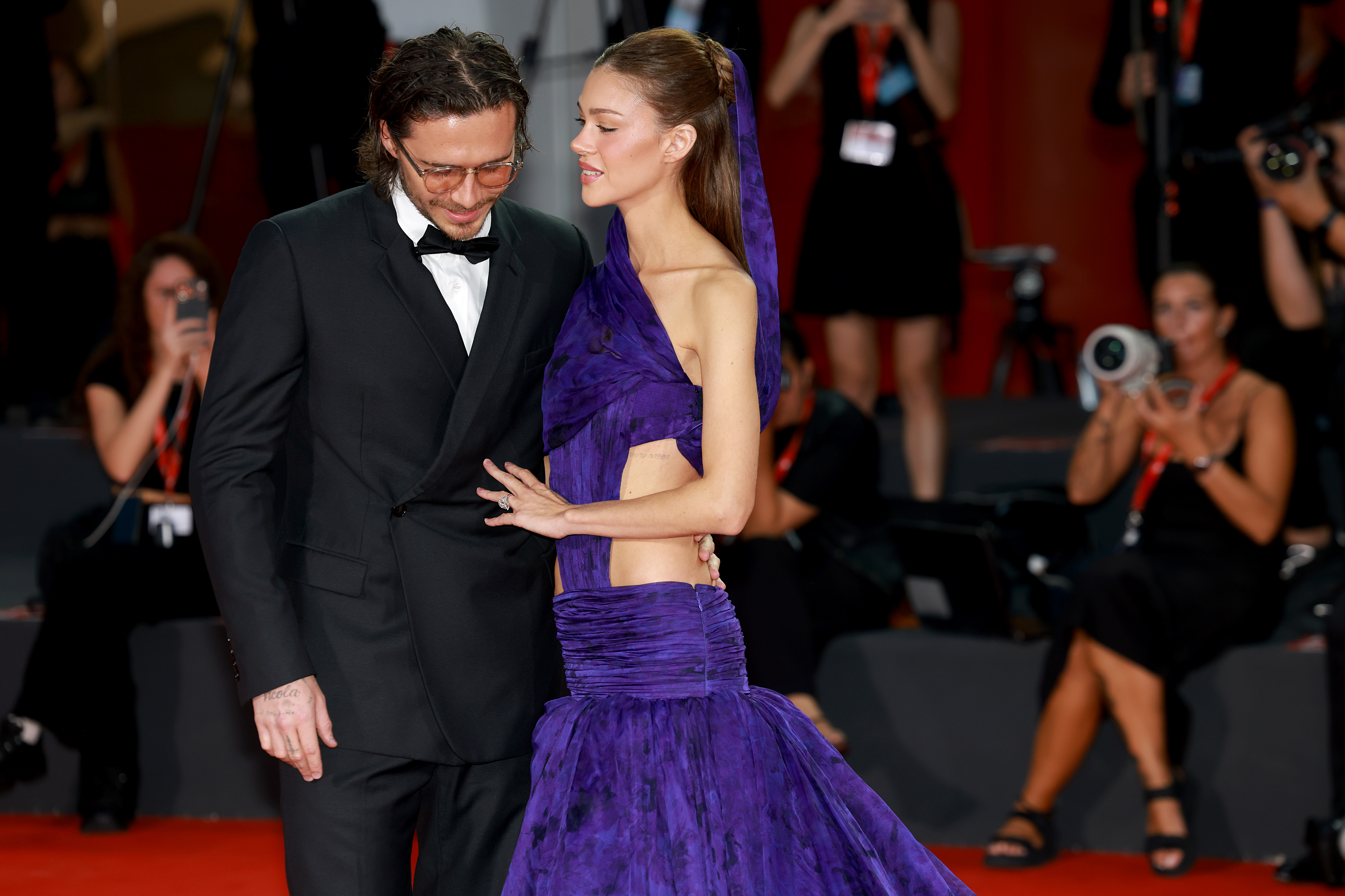 Netizens had a lot to say about his hair, but also about Nicola's spectacular dress she wore for the Kinéo Award red carpet during the 83rd Venice International Film Festival at Sala Grande on September 5, 2026, in Venice, Italy. | Source: Getty Images