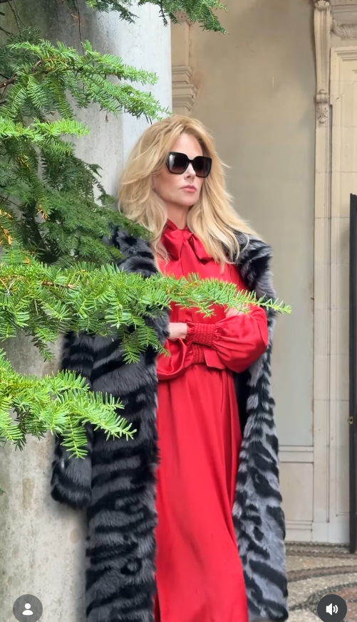 Nicole Kidman poses in a striking red dress and dark sunglasses during her British Vogue cover shoot. The actress says she has always led with her heart rather than overthinking her choices, a quality she continues to rely on as she navigates a new chapter. | Source: Instagram/britishvogue