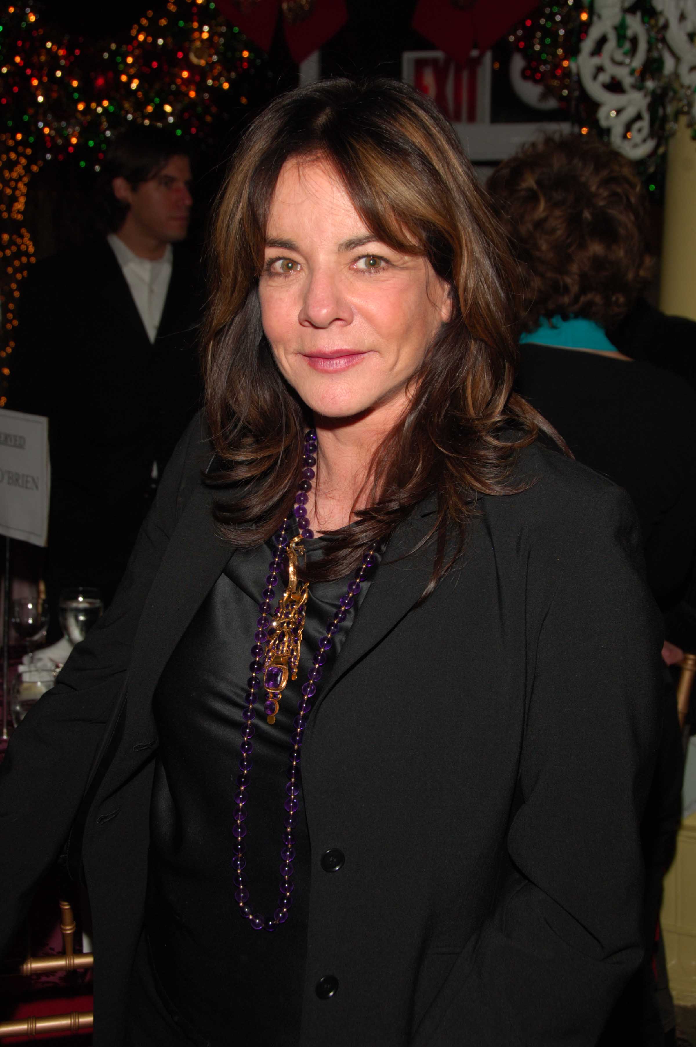 Stockard Channing attends the opening-night after-party for The Coast of Utopia Part One: Voyage at Tavern on the Green in New York City on November 27, 2006, wearing a sleek black ensemble accented with layered purple and gold jewelry. | Source: Getty Images