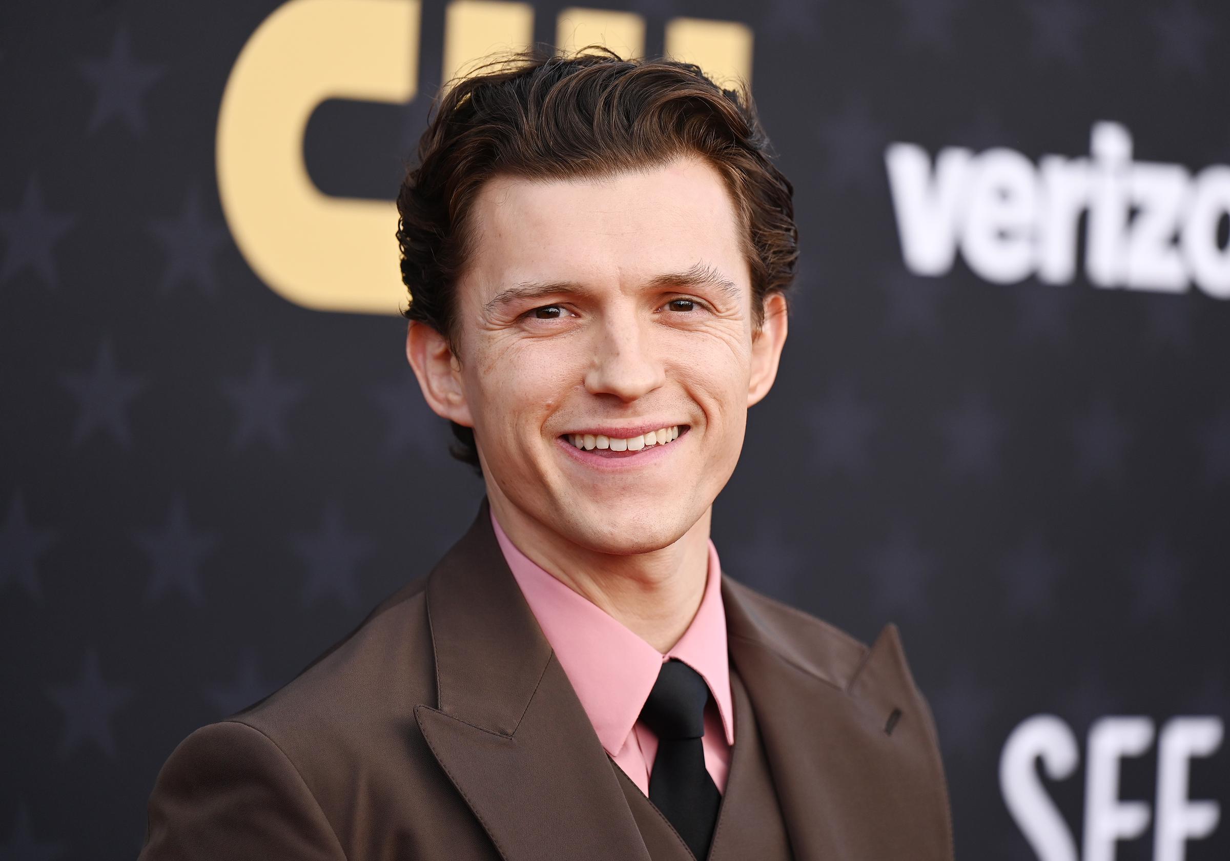 Tom Holland at the 29th Critics' Choice Awards in Santa Monica, posing on the red carpet | Source: Getty Images