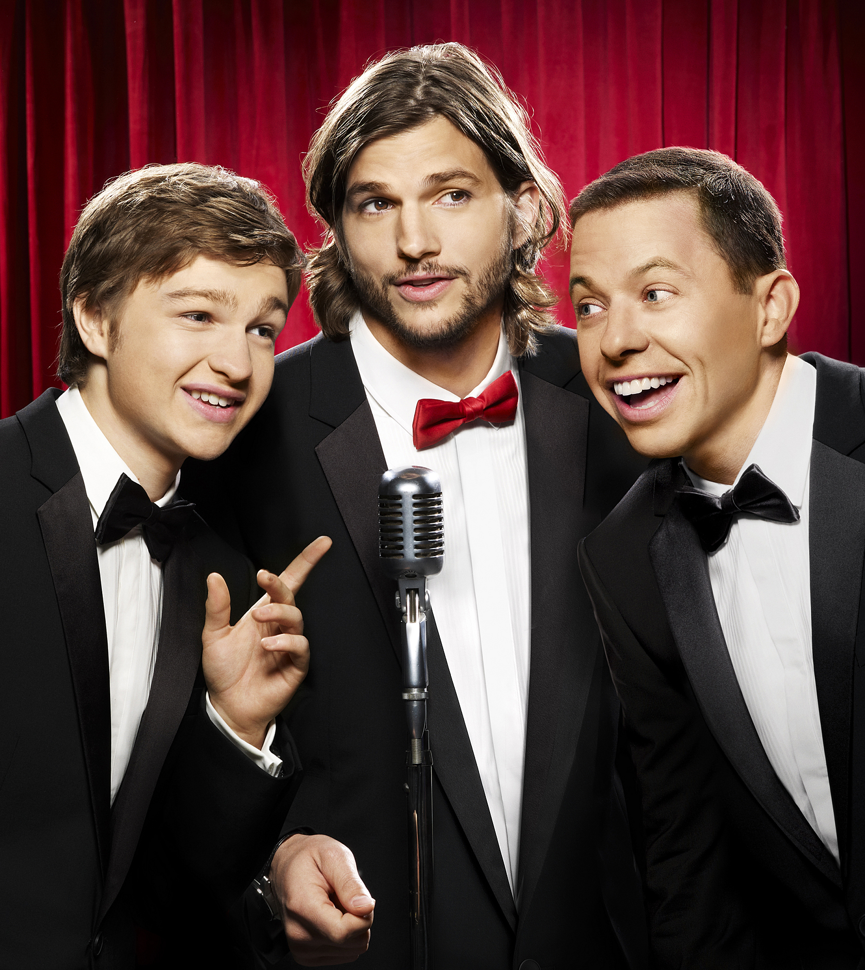 The actor pictured with Ashton Kutcher and Jon Cryer on "Two and a Half Men," in 2011 | Source: Getty Images