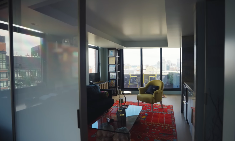 Sophia's "wing" feels more like a private apartment of its own, with a richly patterned rug, cozy seating and another enviable slice of the Manhattan skyline. It is easy to see why Christopher joked that the space was designed "intentionally" to keep his daughter at home a little longer. | Source: YouTube/Architectural Digest