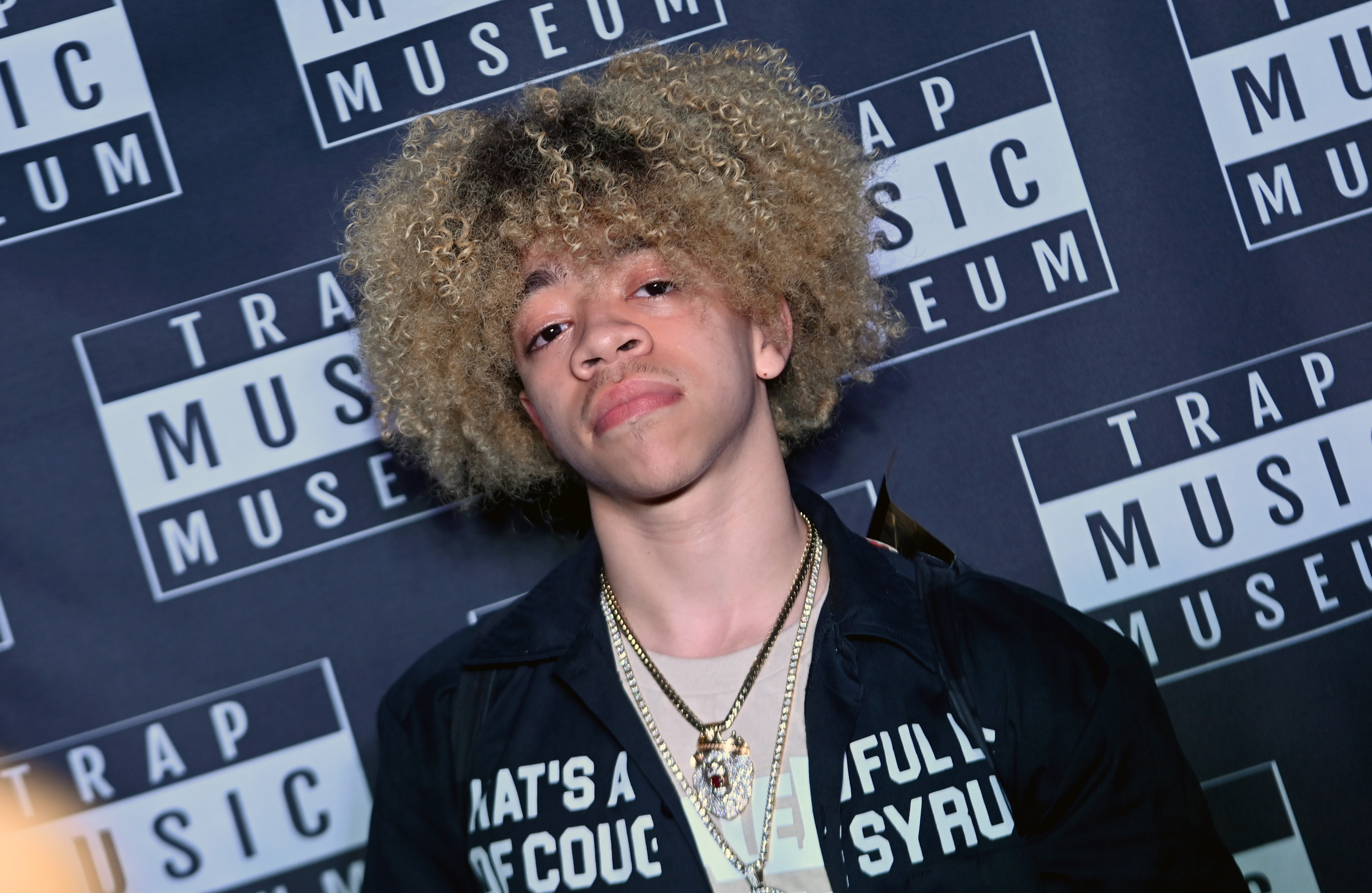 King Harris attends the "Trapper Of The Year" art exhibit unveiling honoring Moneybagg Yo in Atlanta, on March 24, 2022 | Source: Getty Images