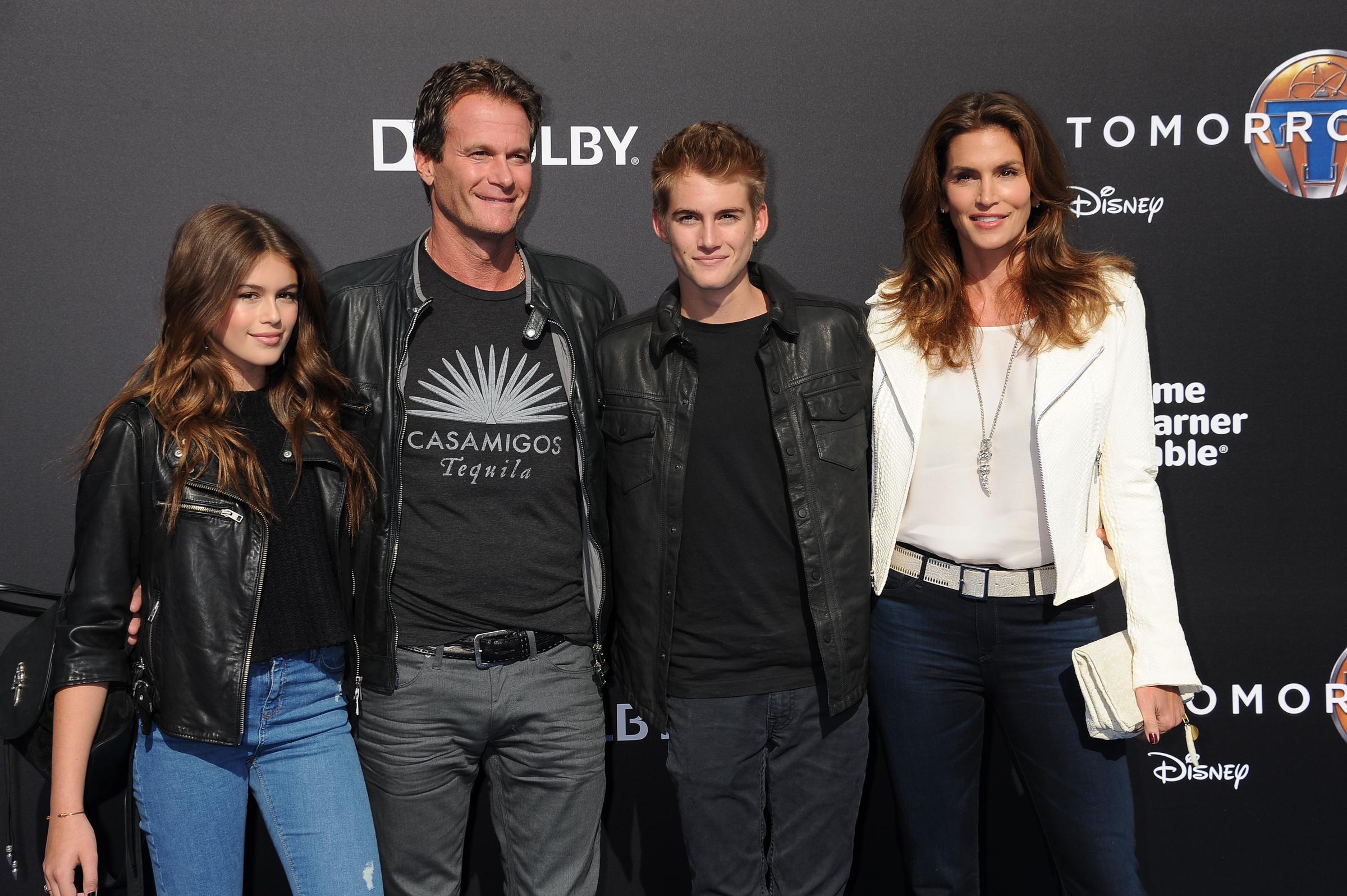 Kaia Gerber, Rande Gerber, Presley Gerber, and Cindy Crawford formed a stylish family quartet on the blue carpet at the world premiere of "Tomorrowland" at the AMC Downtown Disney 12 Theatres in Anaheim, California, coordinating in sleek jackets and denim. | Source: Getty Images