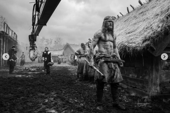 Alexander Skarsgård displayed Amleth's powerful physique while filming "The Northman," with the behind-the-scenes image also showing the production setup around him. The photo appeared in an October 15, 2024, post. | Source: Instagram/aidanmonaghanphotographer