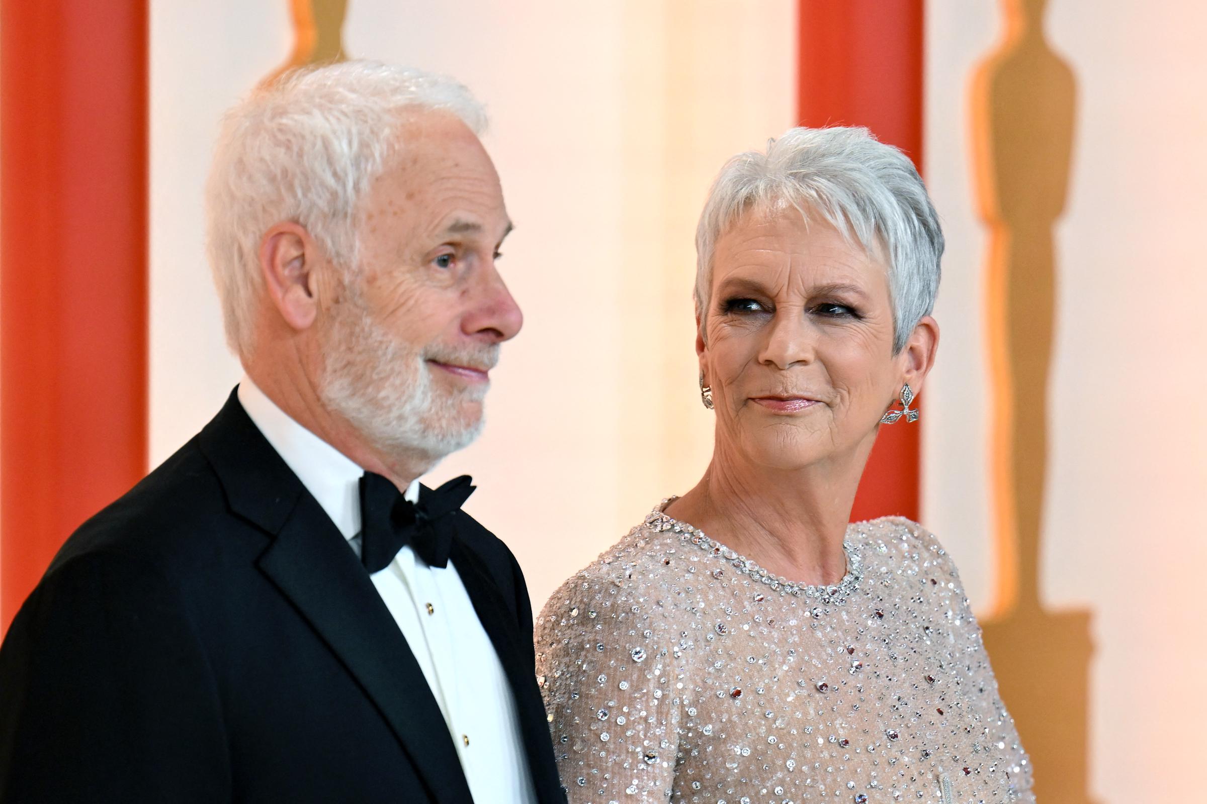 Christopher Guest and Jamie Lee Curtis at the 95th Annual Academy Awards at the Dolby Theatre in Hollywood, California, on March 12, 2023. | Source: Getty Images