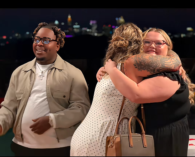 Pumpkin embraces her sister Alana Thompson after the proposal, sharing an emotional moment as Dralin Carswell stands beside them. The family celebration continues against the backdrop of the nighttime city skyline. | Source: TikTok/Mama P