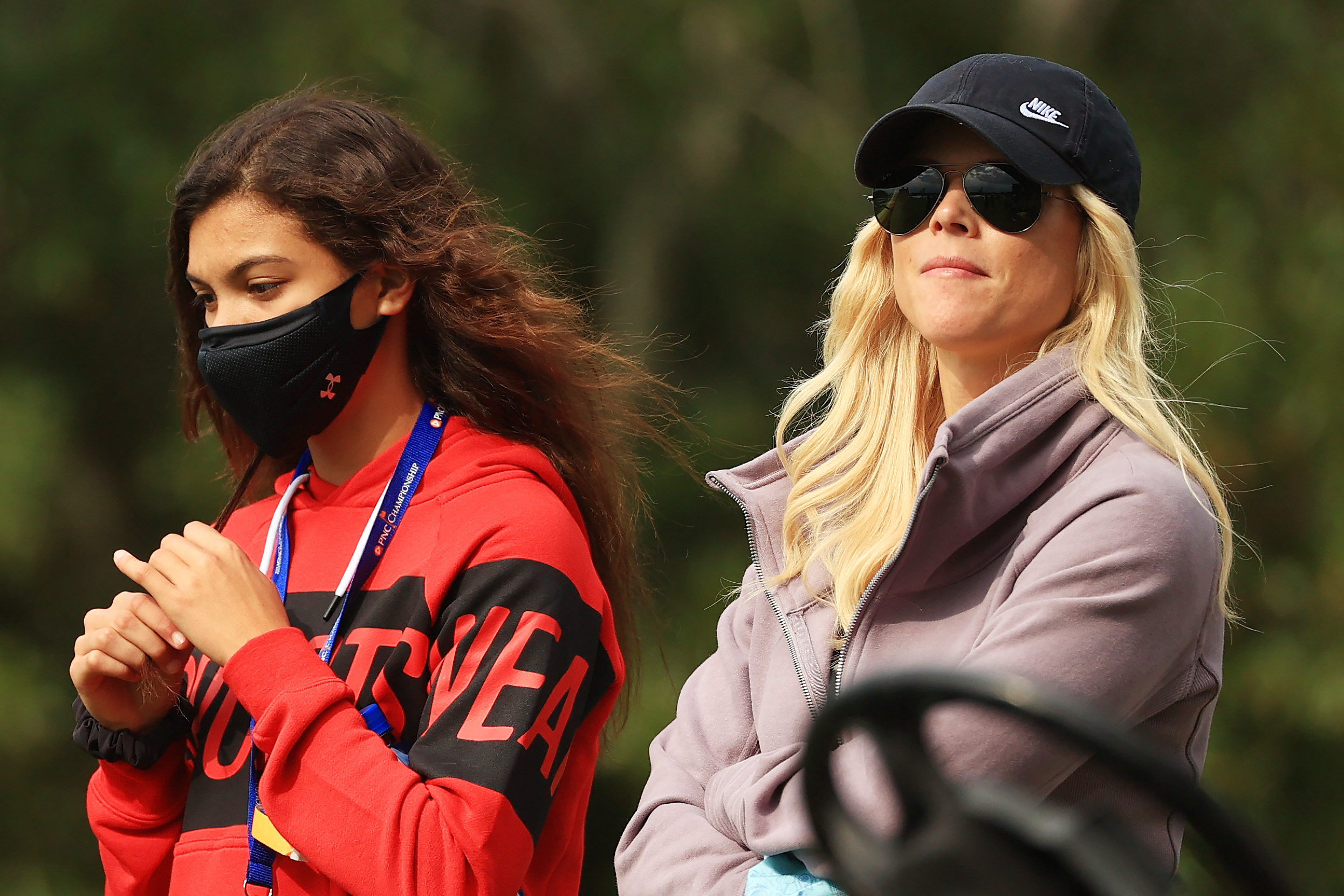Sam Woods and Elin Nordegren look on during the final round of the PNC Championship at the Ritz-Carlton Golf Club Orlando on December 20, 2020, in Orlando, Florida | Source: Getty Images