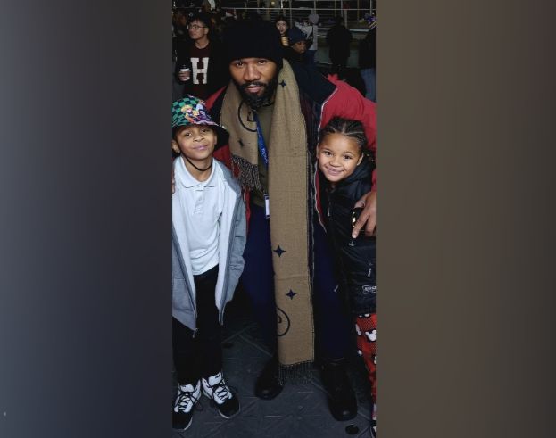Samuel Monroe Jr. poses with two children in a family photo featured on the fundraiser launched to support the actor and his family during his ongoing health battle. | Source: GoFundMe