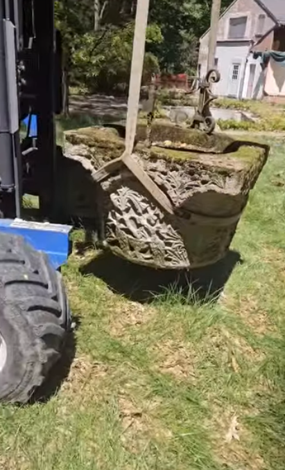 Workers salvaged this historic stone wellhead from Richard Gere's former Connecticut estate before the property was demolished. Although the house was later torn down, preservation efforts saved several architectural features connected to the estate's history.  | Source: Instagram/hudsonvalleyhouseparts