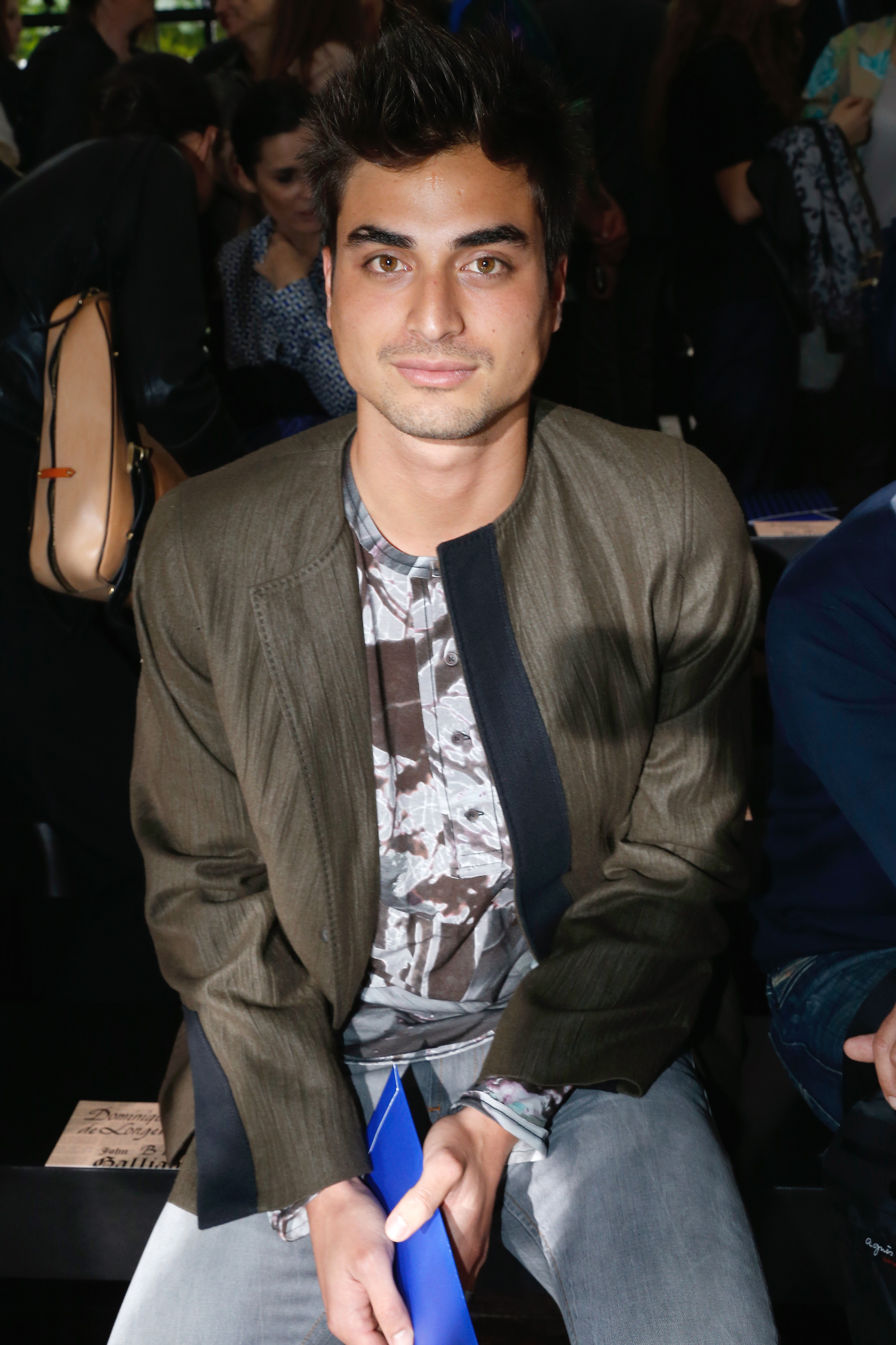 Tuki Brando attends the John Galliano Menswear Spring/Summer 2014 show during Paris Fashion Week in France on June 28, 2013. His work for leading designers and luxury labels helped establish him within the fashion industry, years after tragedy had defined the earliest chapter of his life.