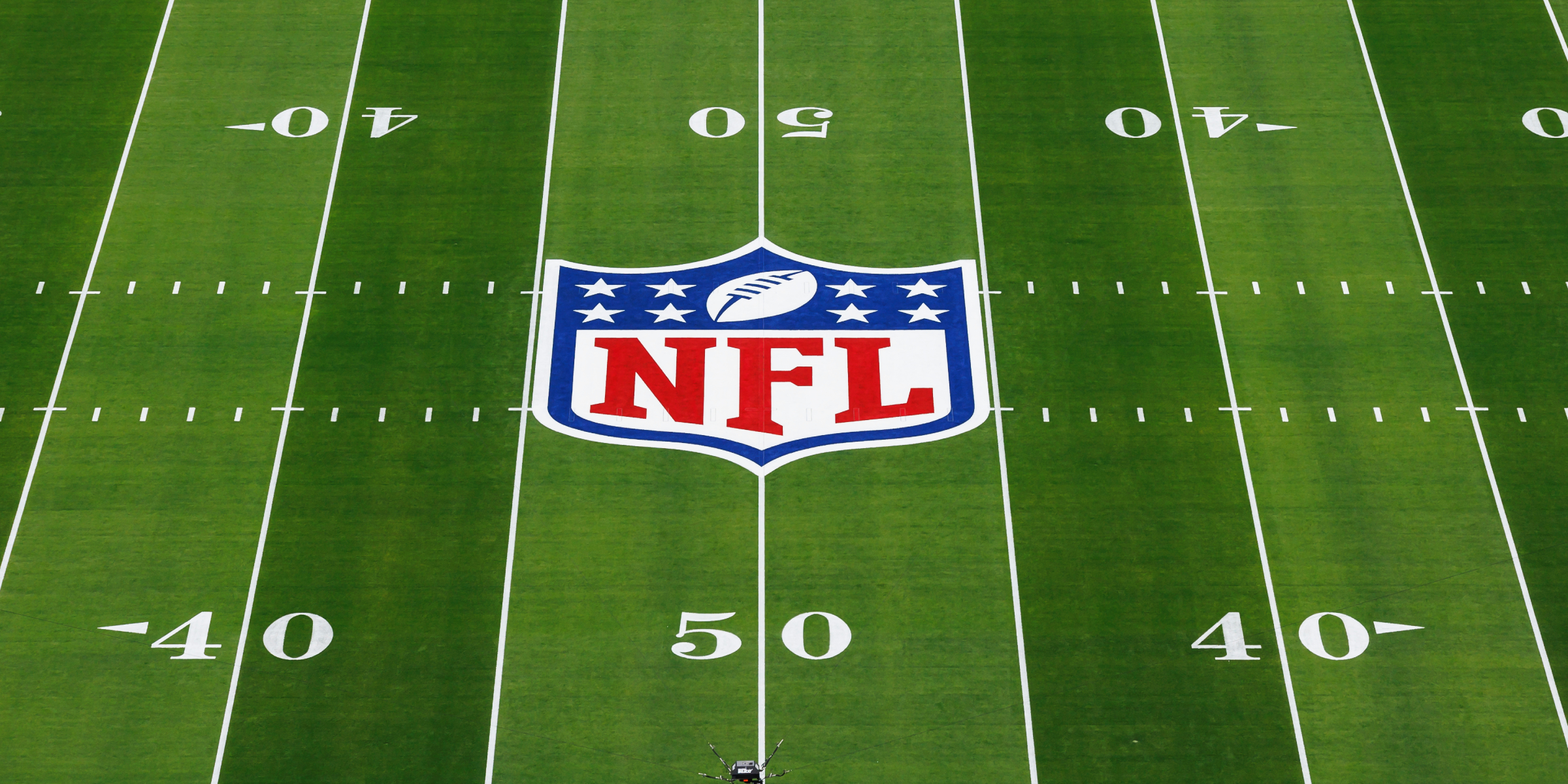 The NFL logo on a field | Source: Getty Images