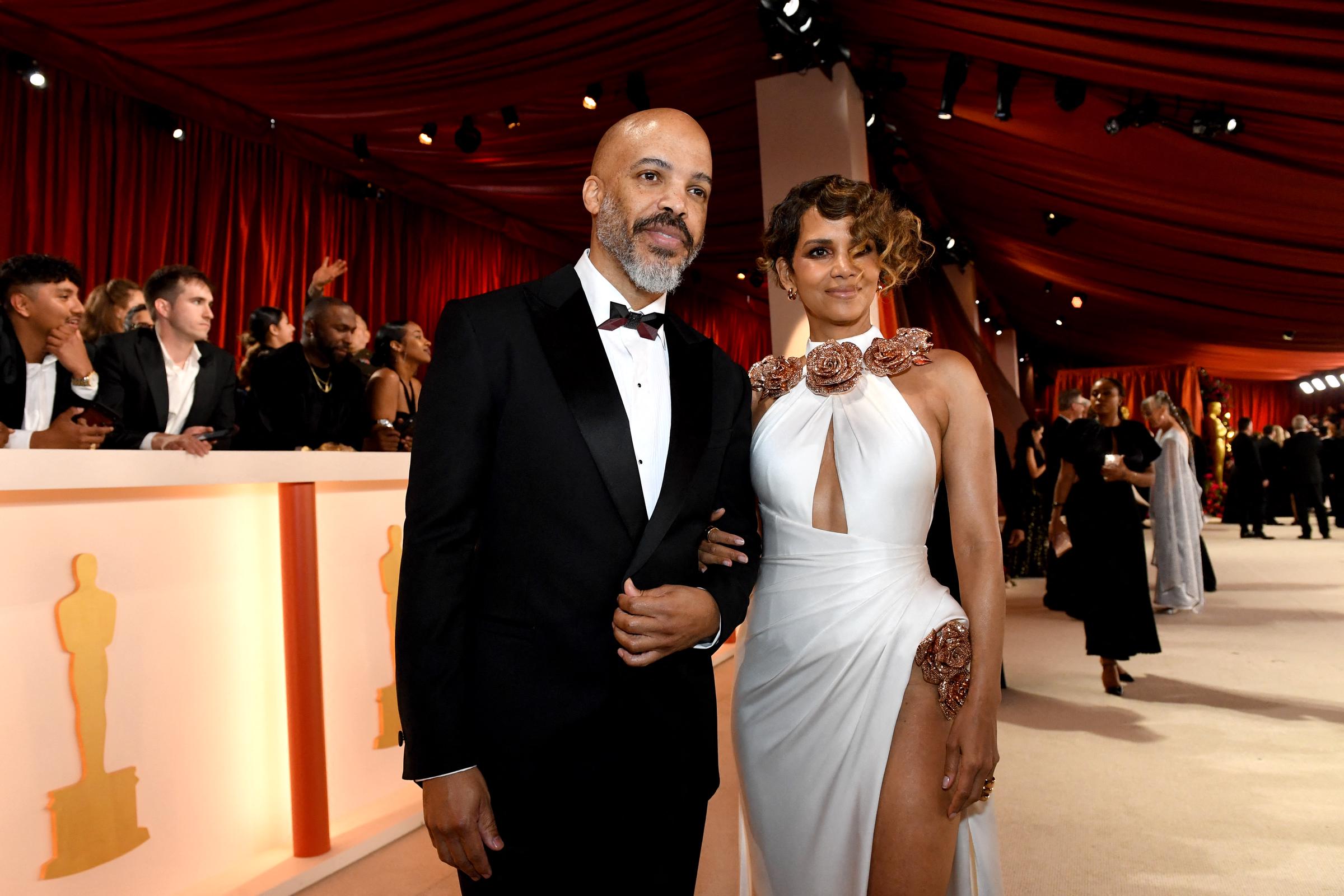 Berry and Hunt looked every inch the glamorous couple at a formal event, with Berry linking her arm through the musician's. Their romance began with months of conversation rather than red-carpet spectacle, but they have since become a familiar pair in public.