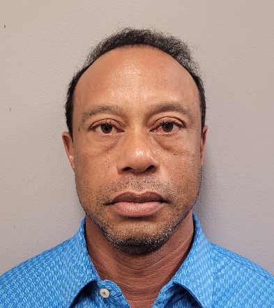 Tiger Woods posing for his booking photo after his arrest; photo provided by the Martin County Sheriff's Office in Stuart, Florida on March 27, 2026. | Source: Getty Images