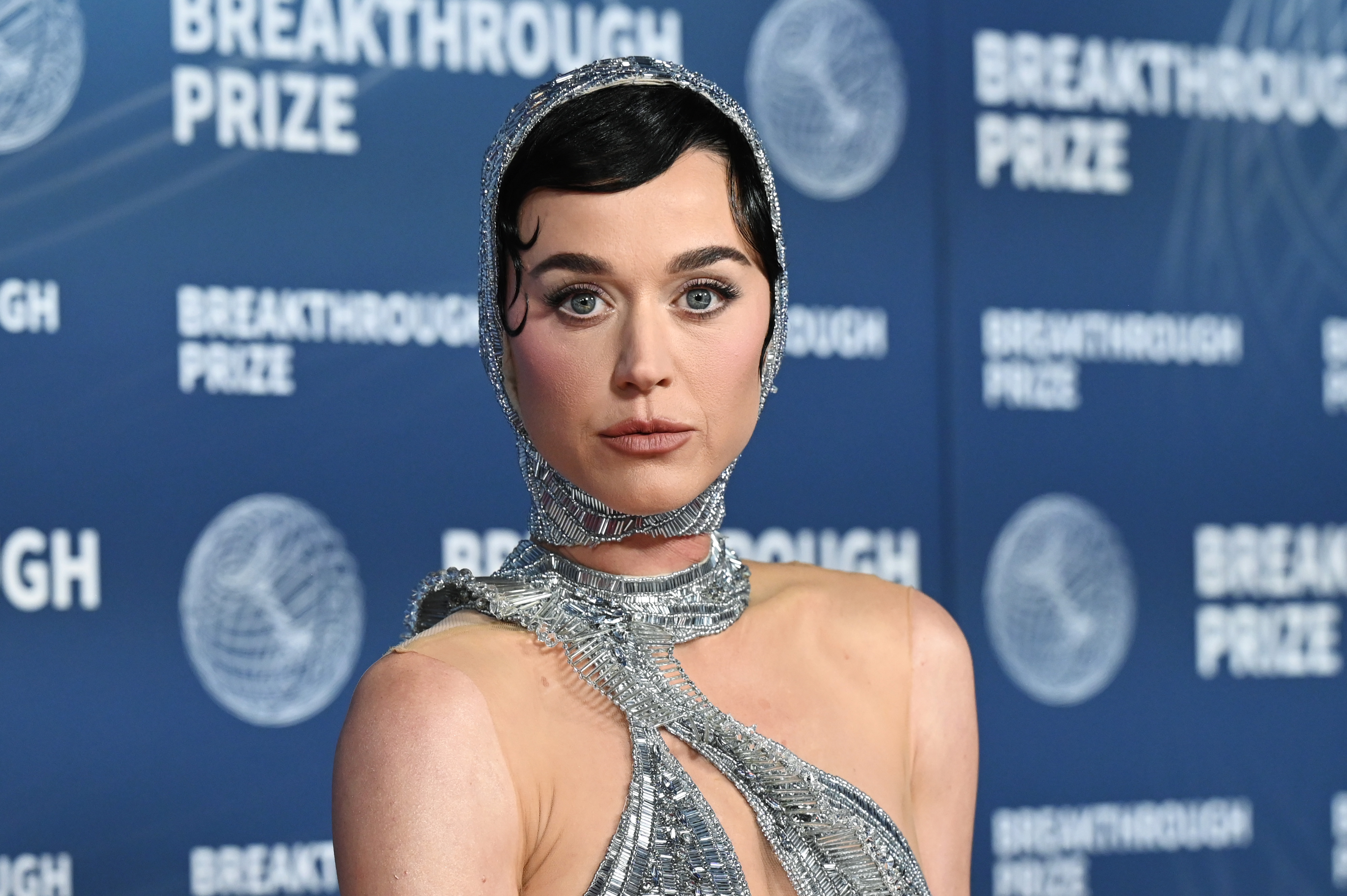 Just months before Perry and Trudeau were spotted together, the singer stepped out in a silver outfit with a matching headpiece. She attended the Breakthrough Prize Ceremony in Santa Monica, California, on April 5, 2025. | Source: Getty Images