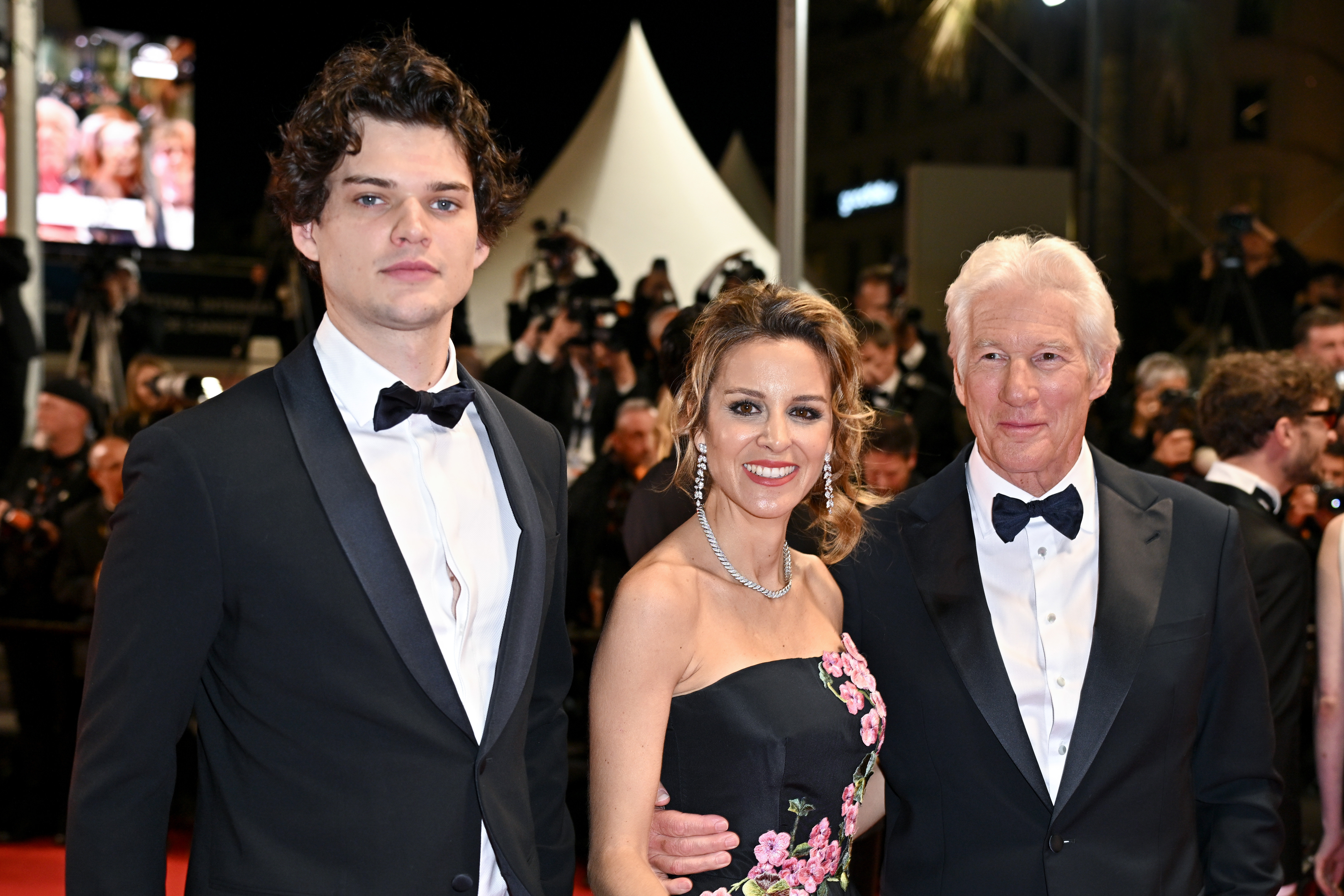 Homer James Jigme Gere, Alejandra Silva, and Richard Gere attend the Oh, Canada red carpet at the Cannes Film Festival in Cannes, France.