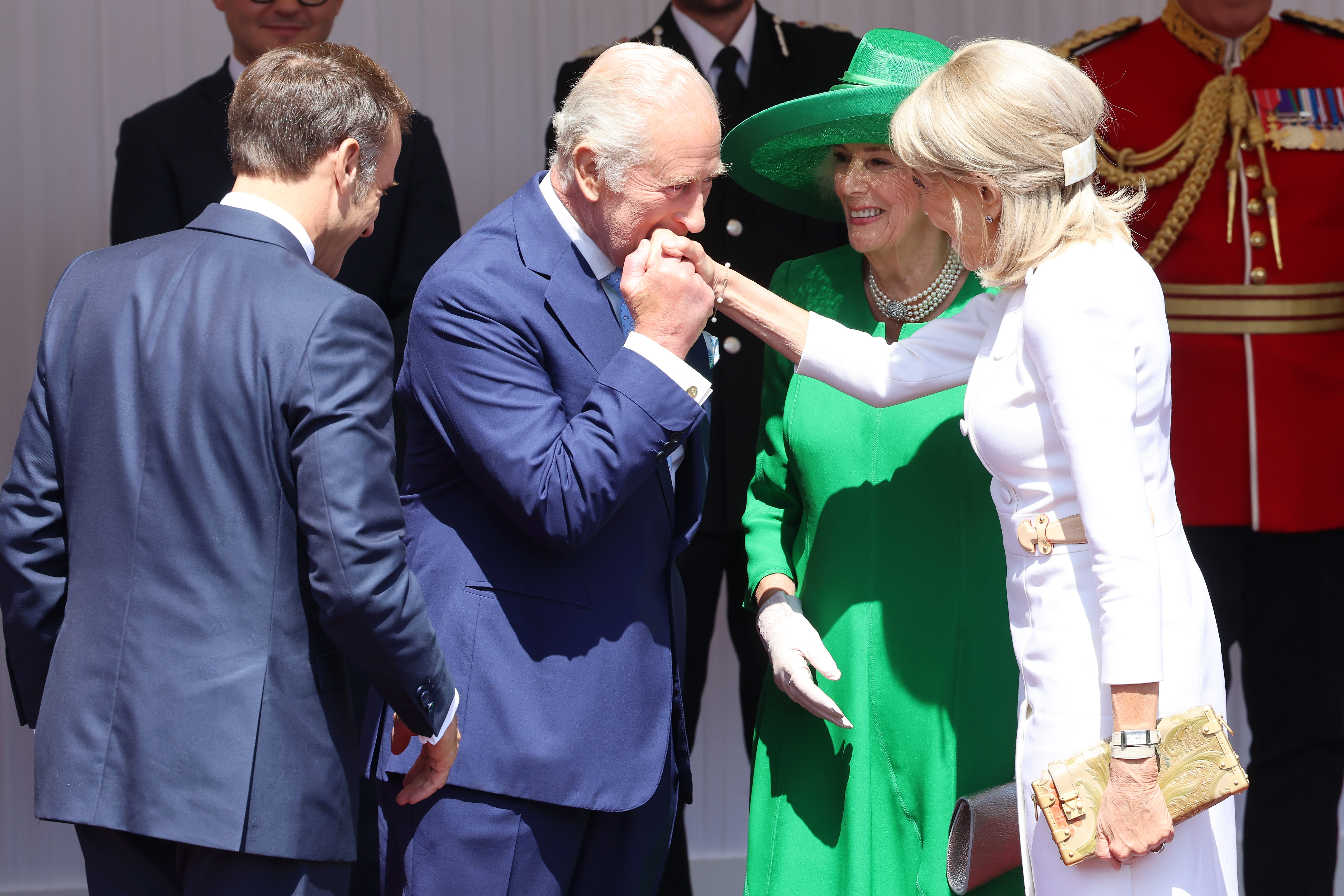 King Charles III and Queen Camilla welcoming Emmanuel and Brigitte Macron at Datchet Road in Windsor, England on July 8, 2025. | Source: Getty Images
