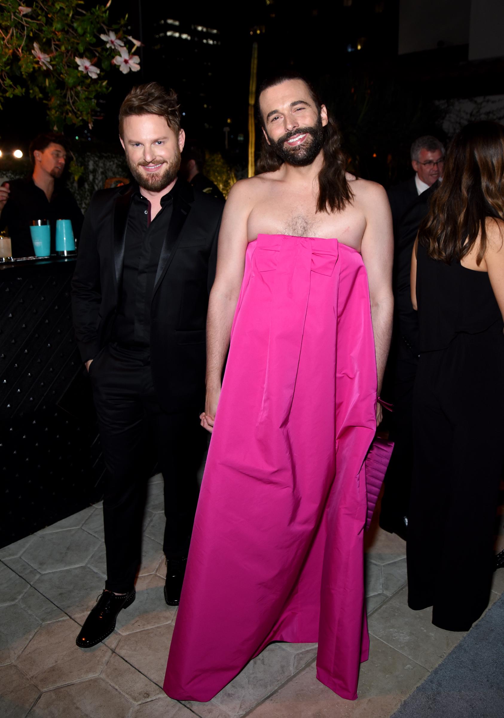 Jonathan Van Ness smiles alongside Bobby Berk at the Netflix Creative Arts Emmy after-party in Los Angeles | Source: Getty Images