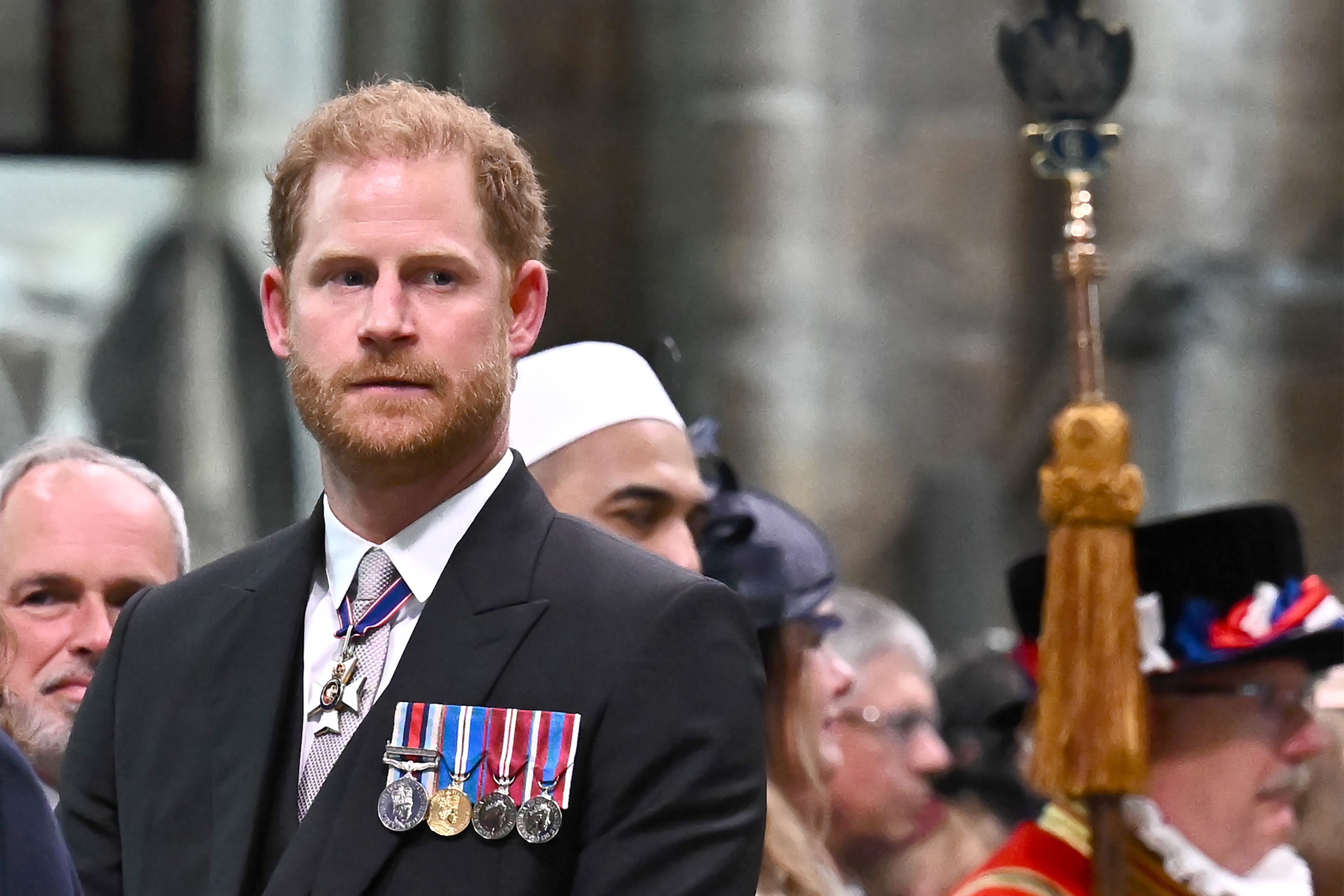 Harry attended the coronation wearing a morning suit decorated with his Afghanistan and Jubilee medals, rather than the military uniform worn by working royals. | Source: Getty Images
