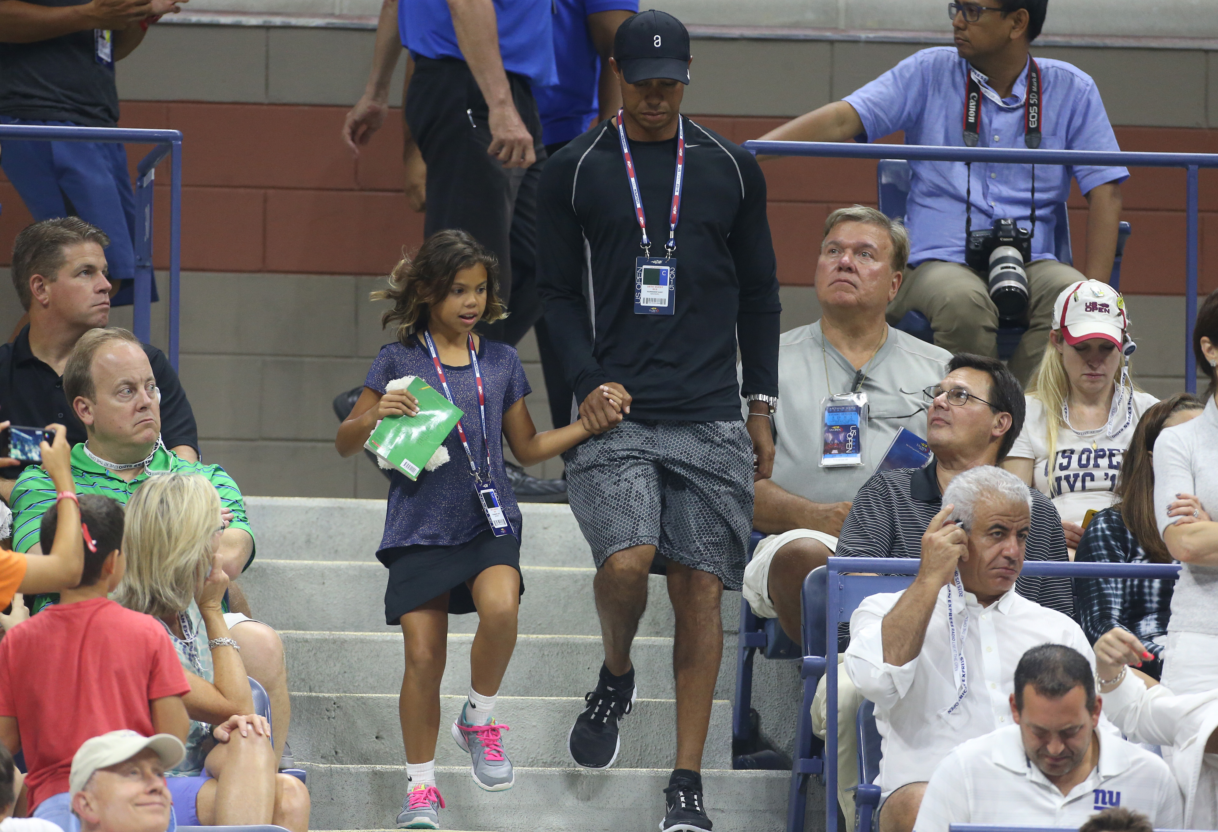 Tiger Woods and Sam Woods attend Rafael Nadal's match against Fabio Fognini in Nadal's box on day five of the US Open at USTA Billie Jean King National Tennis Center on September 4, 2015, in Queens, New York City | Source: Getty Images