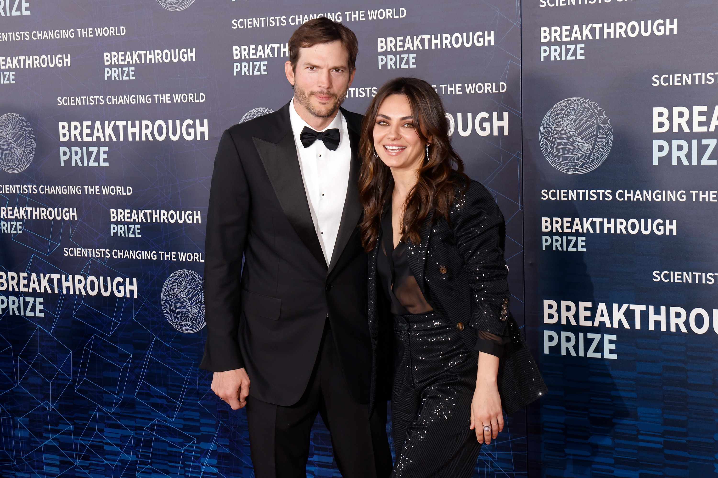 Ashton Kutcher and Mila Kunis at the 9th Annual Breakthrough Prize Ceremony at Academy Museum of Motion Pictures on April 15, 2023, in Los Angeles, California. | Source: Getty Images