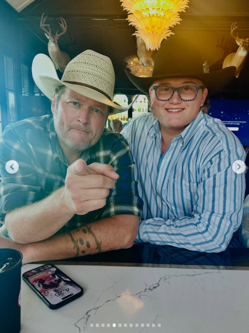 Zuma Rossdale smiled alongside Blake Shelton as both sported cowboy hats and button-down shirts. In this photo, they posed together on August 21, 2025. | Source: Instagram/gwenstefani