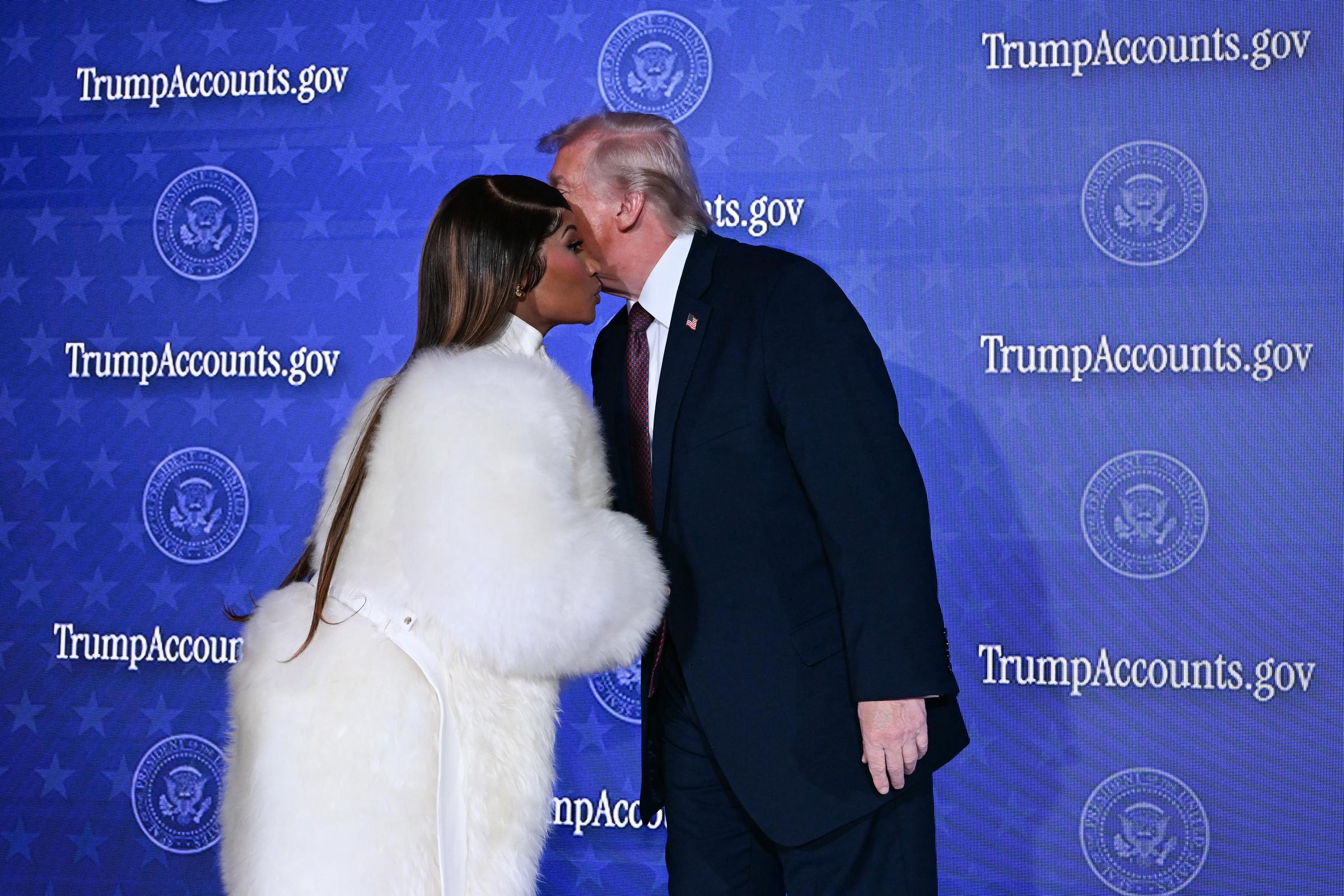 Nicki Minaj and Donald Trump exchanging a greeting. | Source: Getty Images
