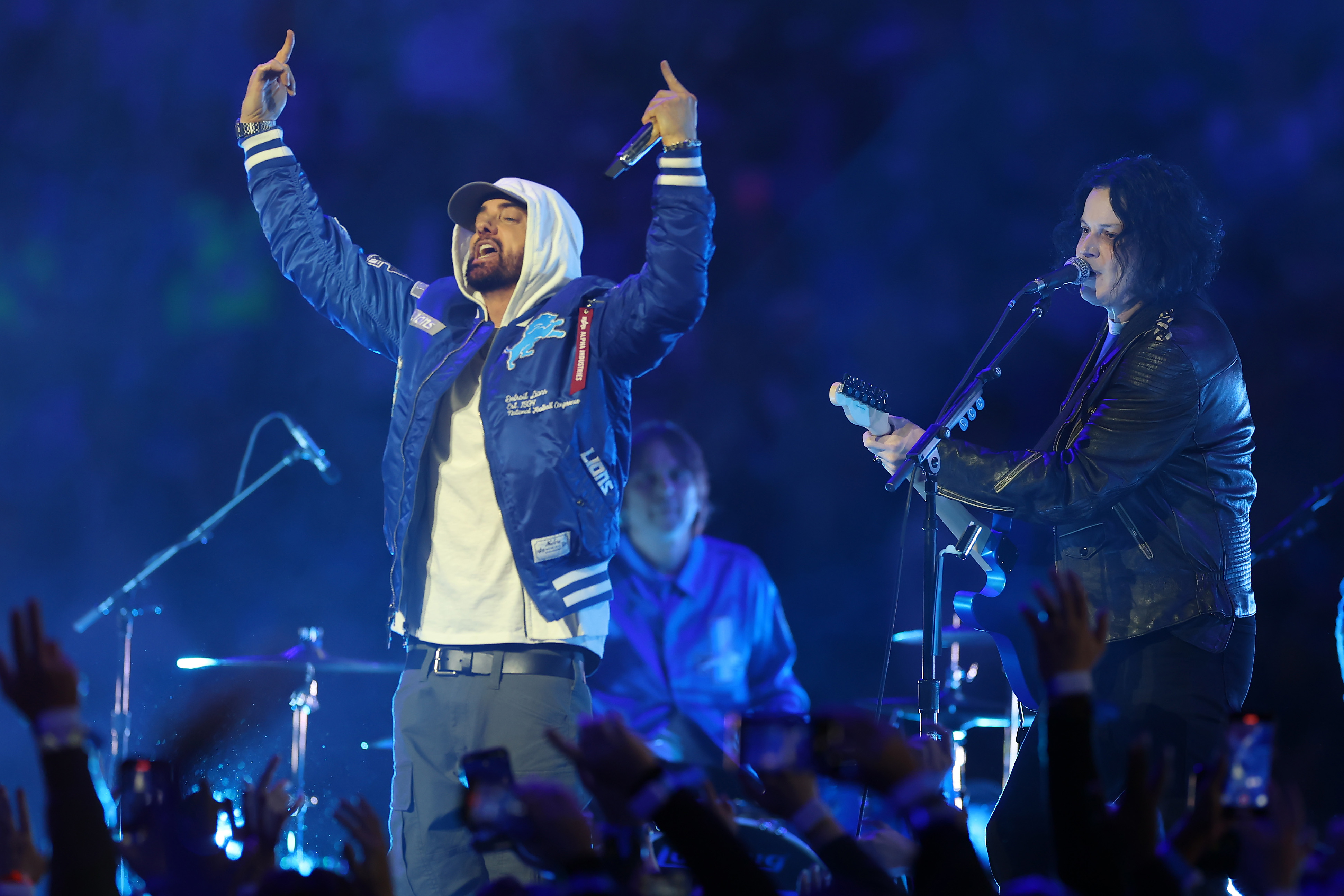 Eminem performs during the halftime show of the game between the Green Bay Packers and the Detroit Lions on November 27, 2025 | Source: Getty Images