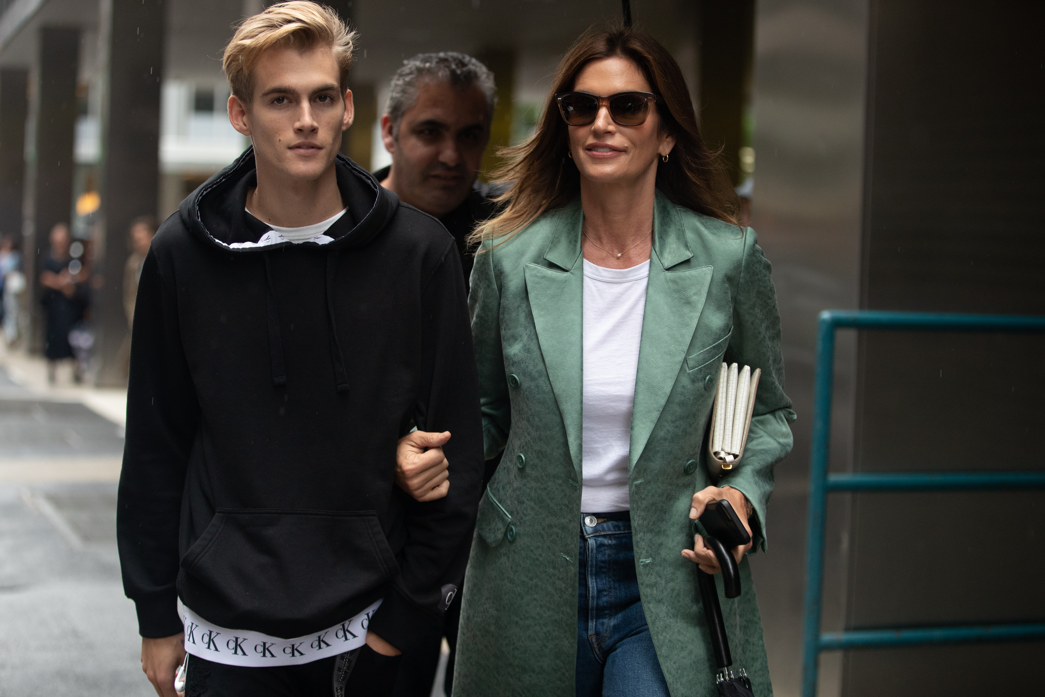 Presley and Cindy walk together during New York Fashion Week on Sept. 9, 2018. Years later, Cindy publicly encouraged her son as he shared his efforts to address his struggles, telling him in an Instagram comment that she was "so proud." | Source: Getty Images